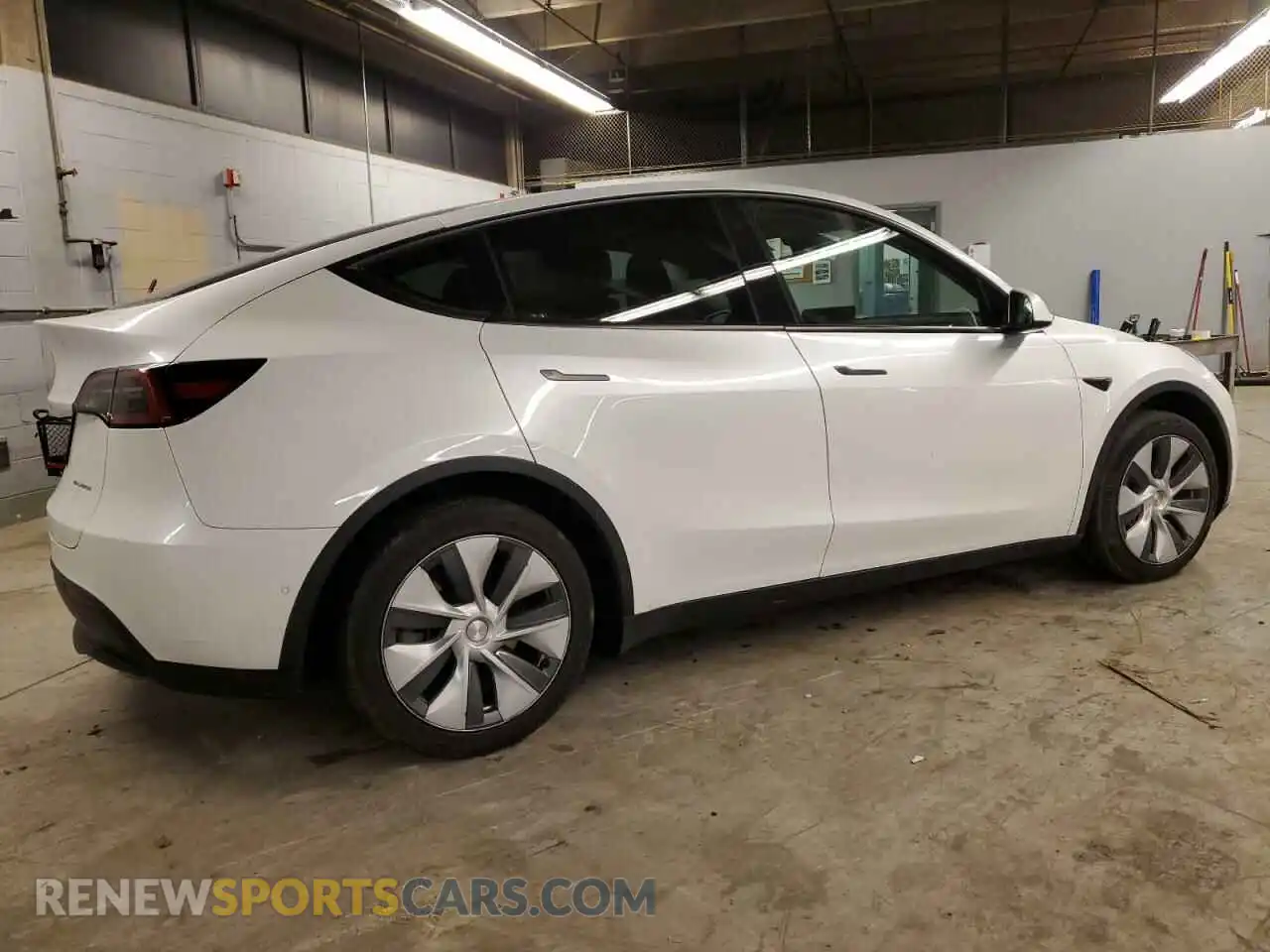 3 Photograph of a damaged car 7SAYGDEEXNA013017 TESLA MODEL Y 2022