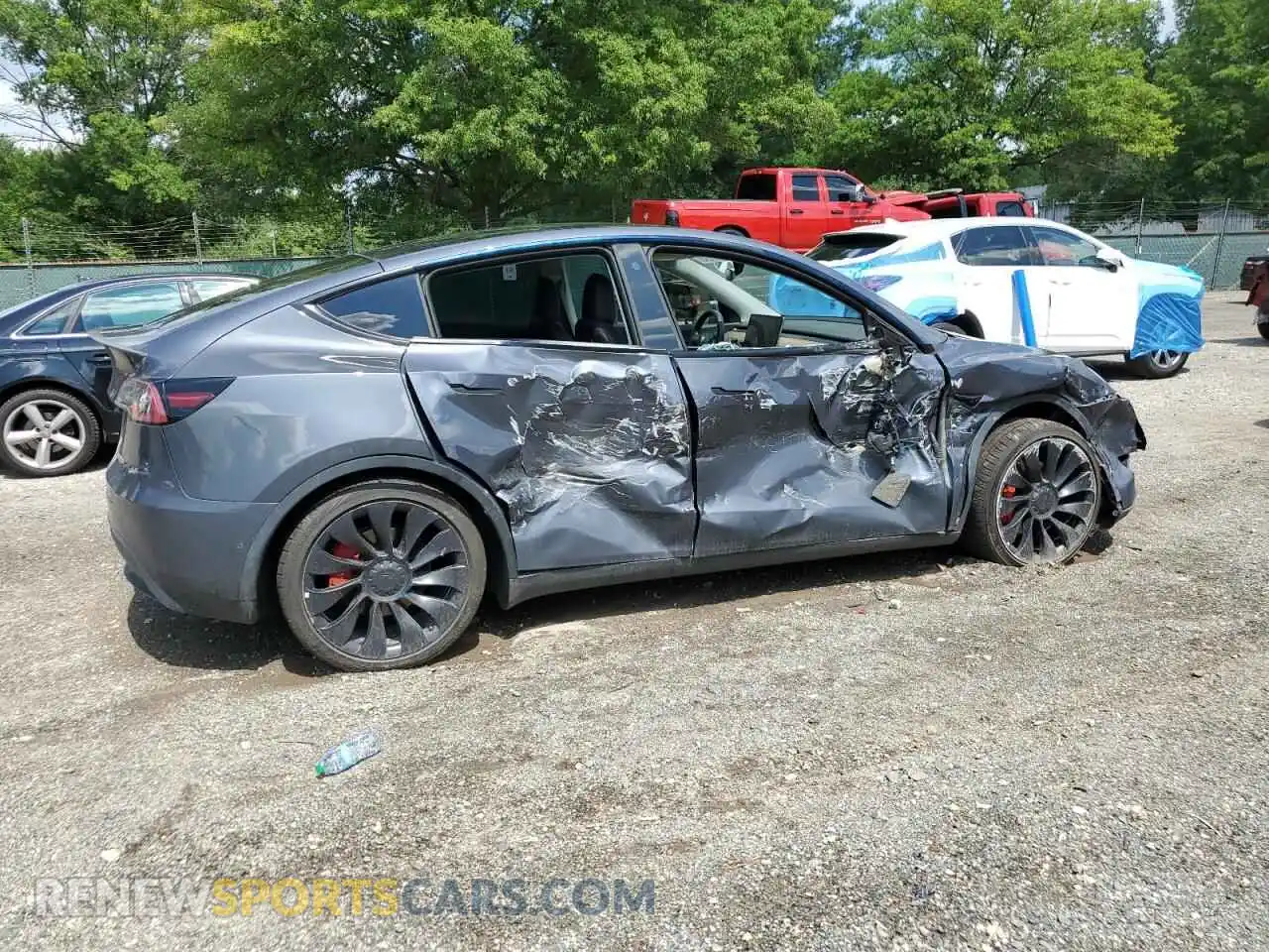 3 Photograph of a damaged car 7SAYGDEF1NF512218 TESLA MODEL Y 2022