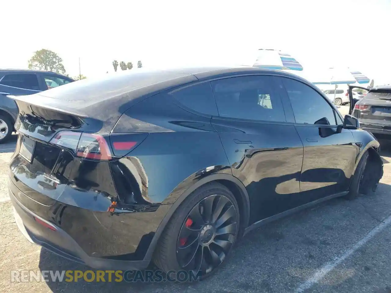 3 Photograph of a damaged car 7SAYGDEF1NF521193 TESLA MODEL Y 2022