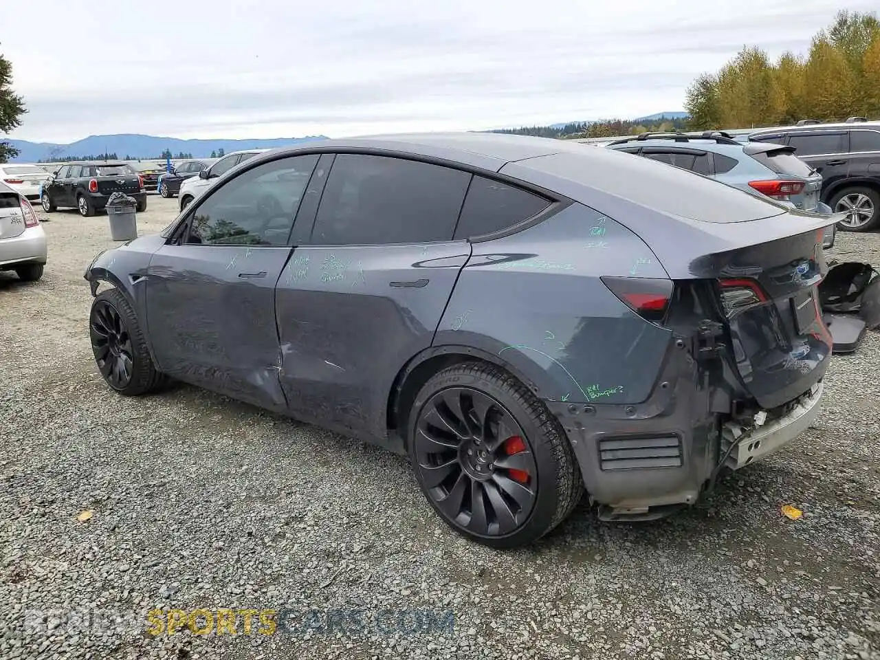 2 fotografías del automóvil dañado 7SAYGDEF2NF544580 TESLA MODEL Y 2022