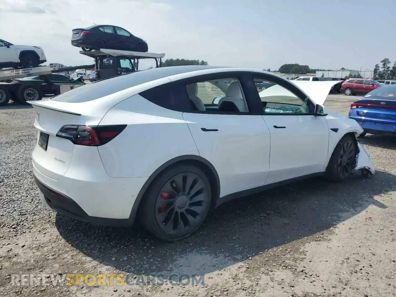 3 Photograph of a damaged car 7SAYGDEF3NF524130 TESLA MODEL Y 2022