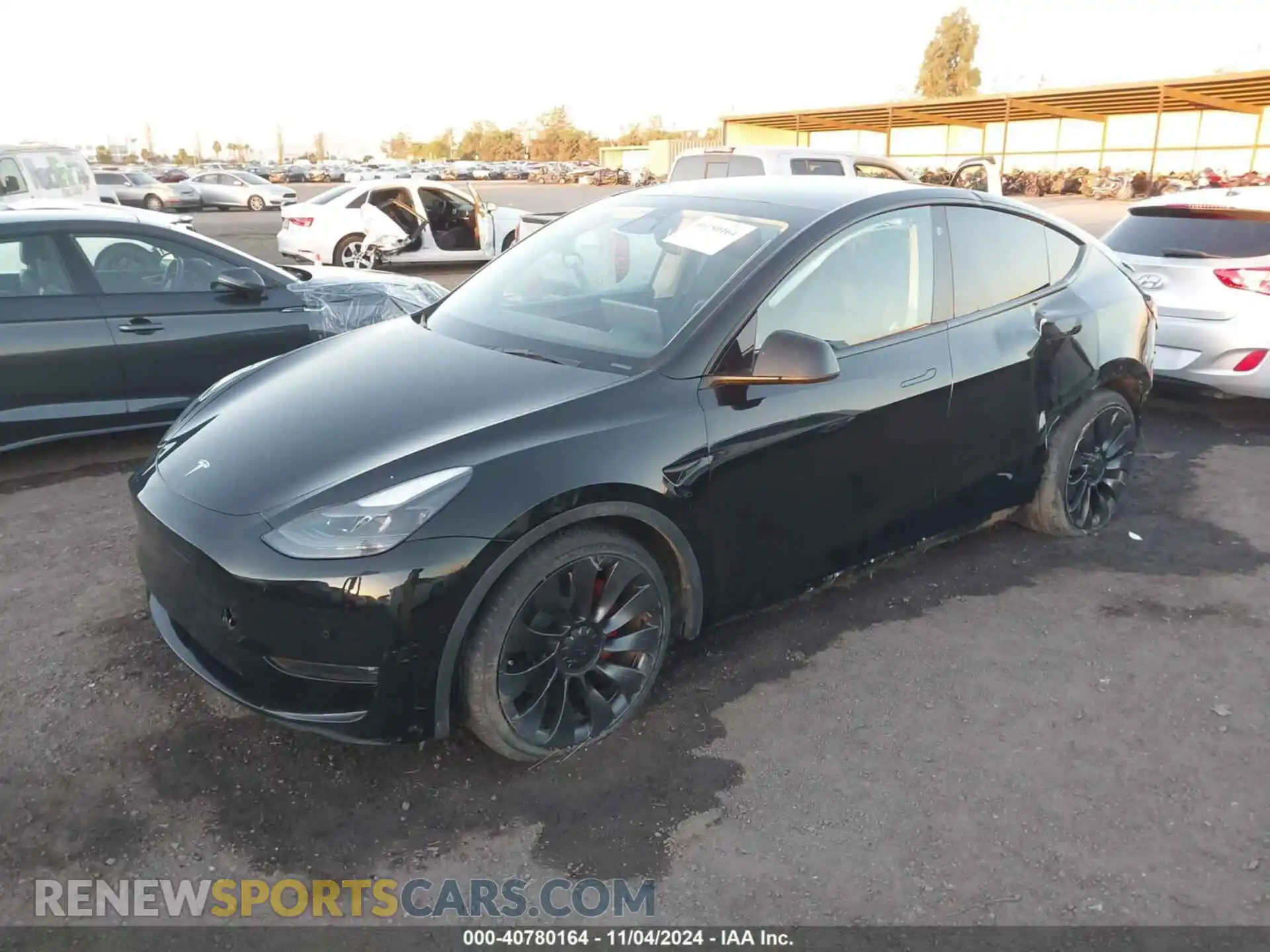 2 fotografías del automóvil dañado 7SAYGDEF4NF546427 TESLA MODEL Y 2022