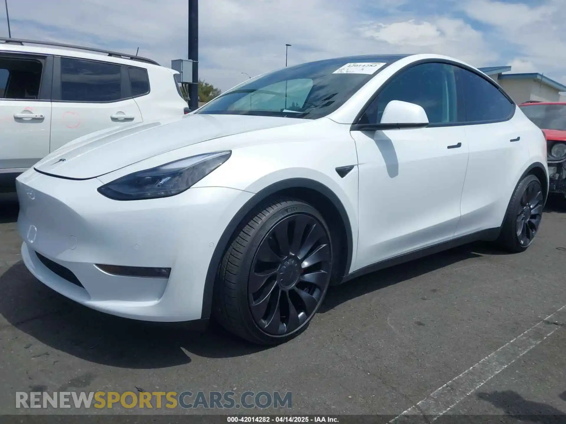 2 fotografías del automóvil dañado 7SAYGDEF8NF407109 TESLA MODEL Y 2022