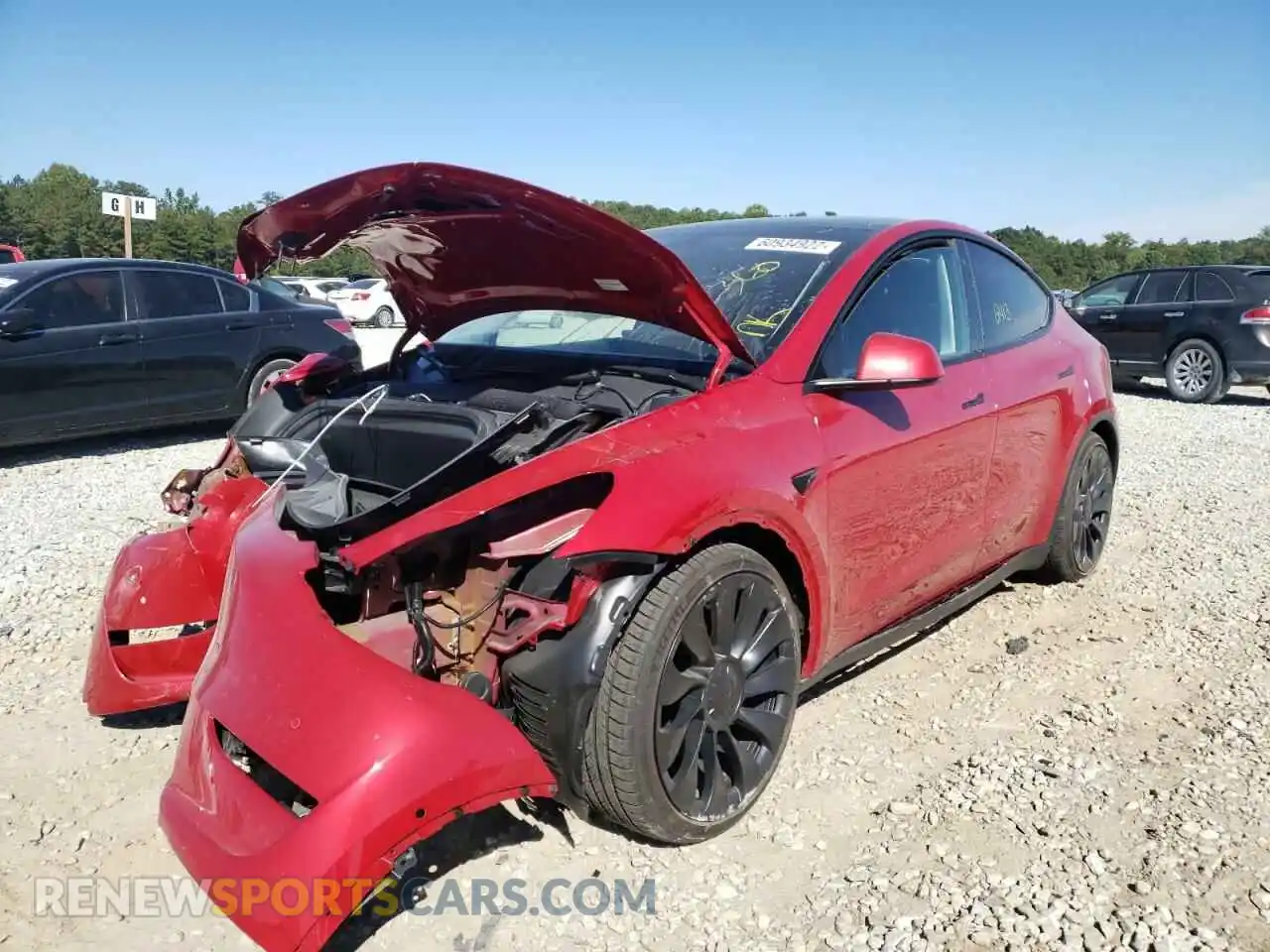 2 fotografías del automóvil dañado 7SAYGDEF8NF517514 TESLA MODEL Y 2022