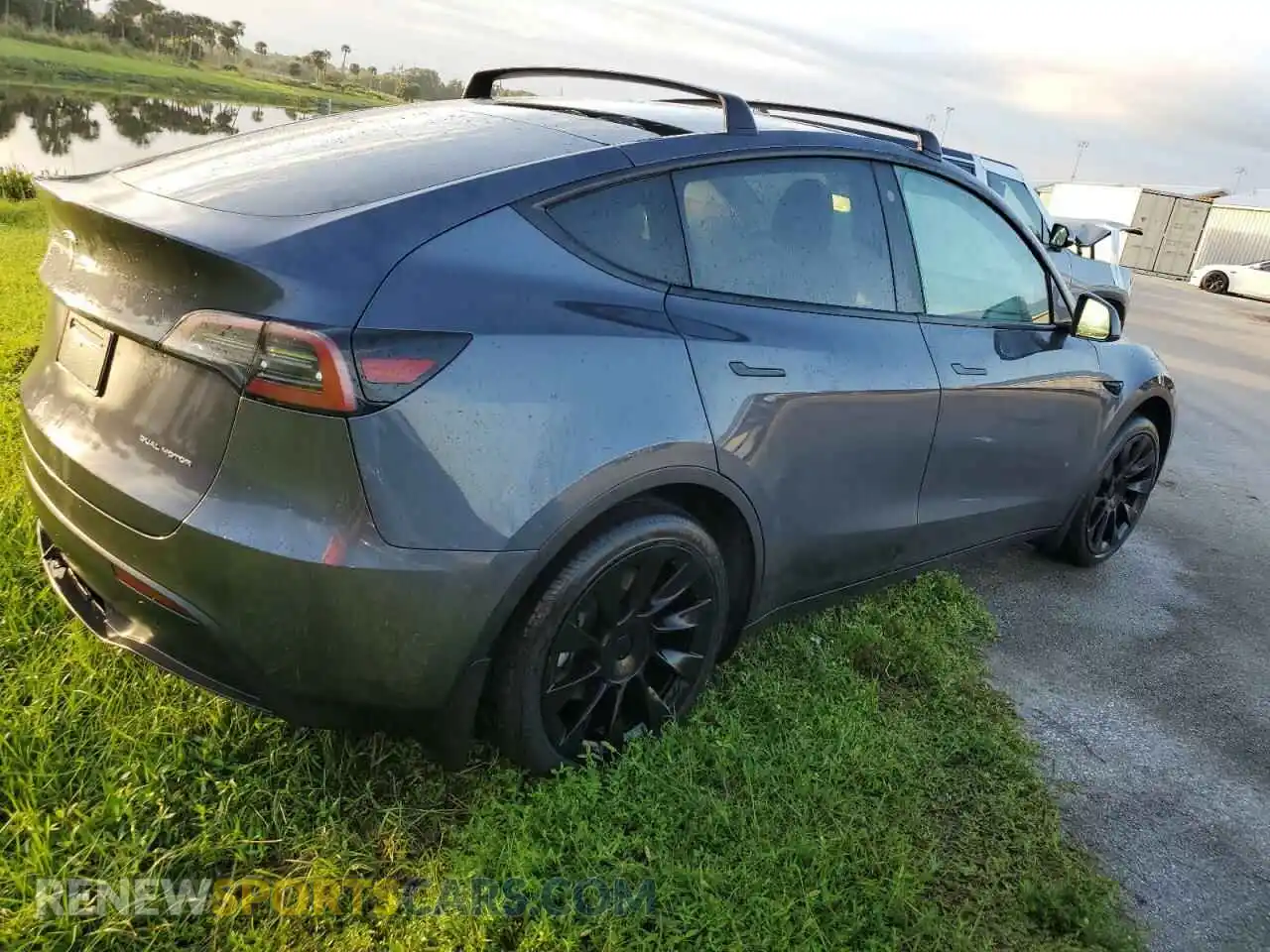 3 Photograph of a damaged car 7SAYGAEE0PF591891 TESLA MODEL Y 2023