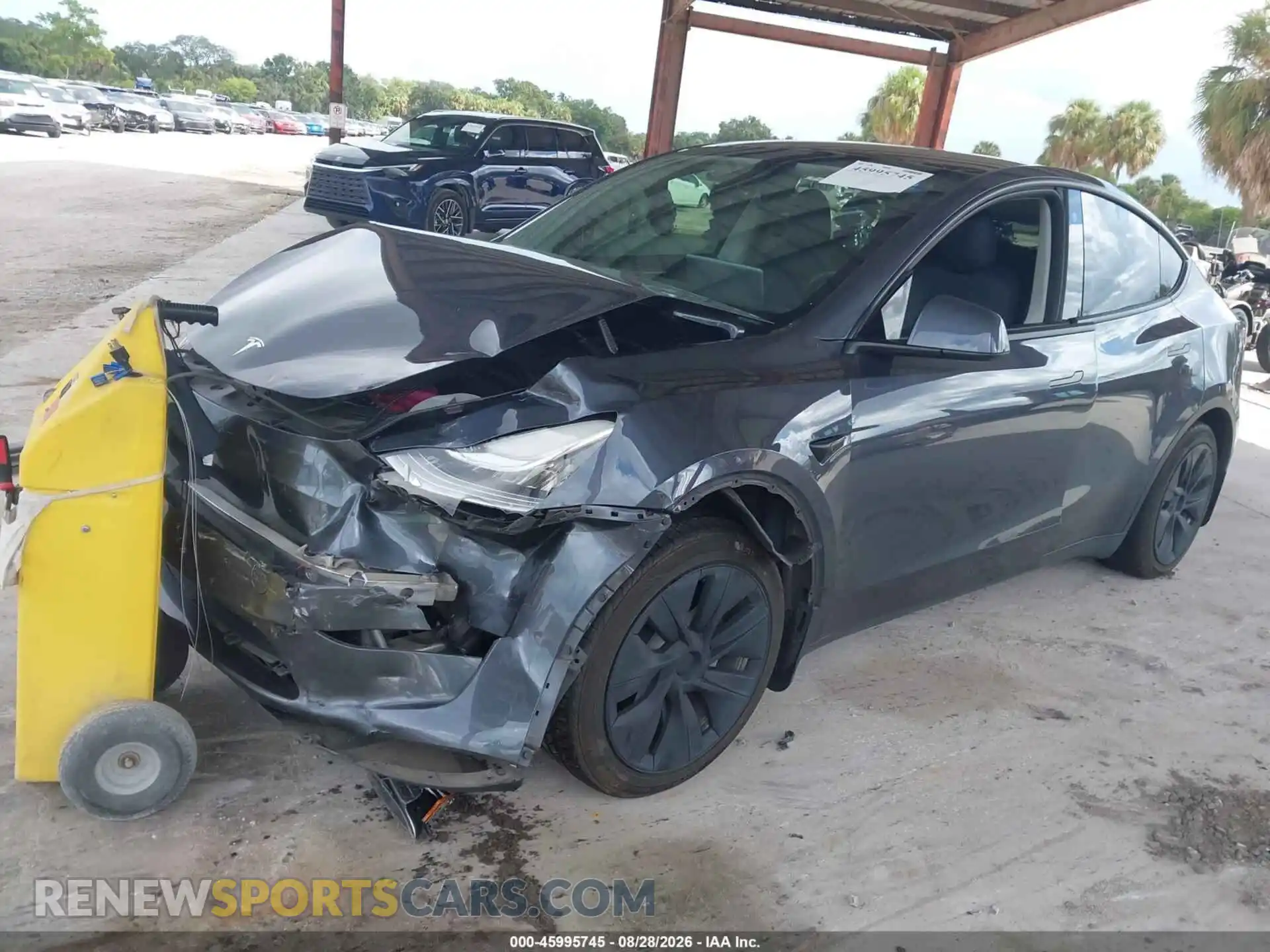 2 fotografías del automóvil dañado 7SAYGAEE0PF597027 TESLA MODEL Y 2023