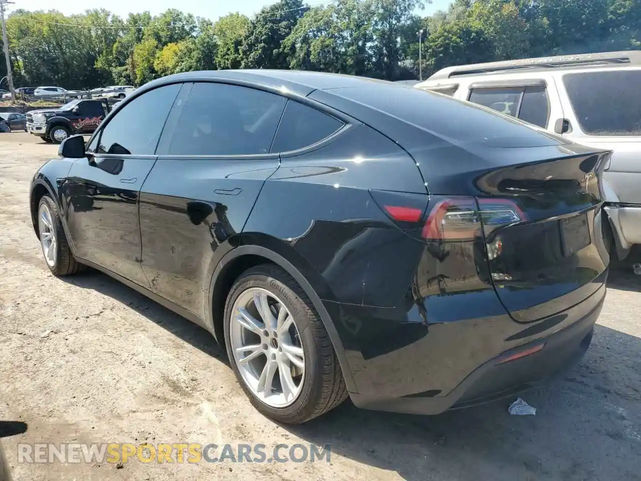 2 fotografías del automóvil dañado 7SAYGAEE0PF925563 TESLA MODEL Y 2023