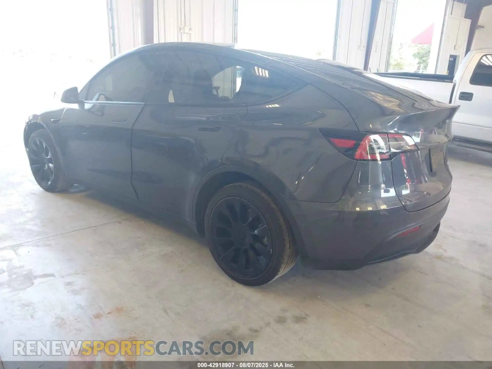 3 Photograph of a damaged car 7SAYGAEE1PF587123 TESLA MODEL Y 2023