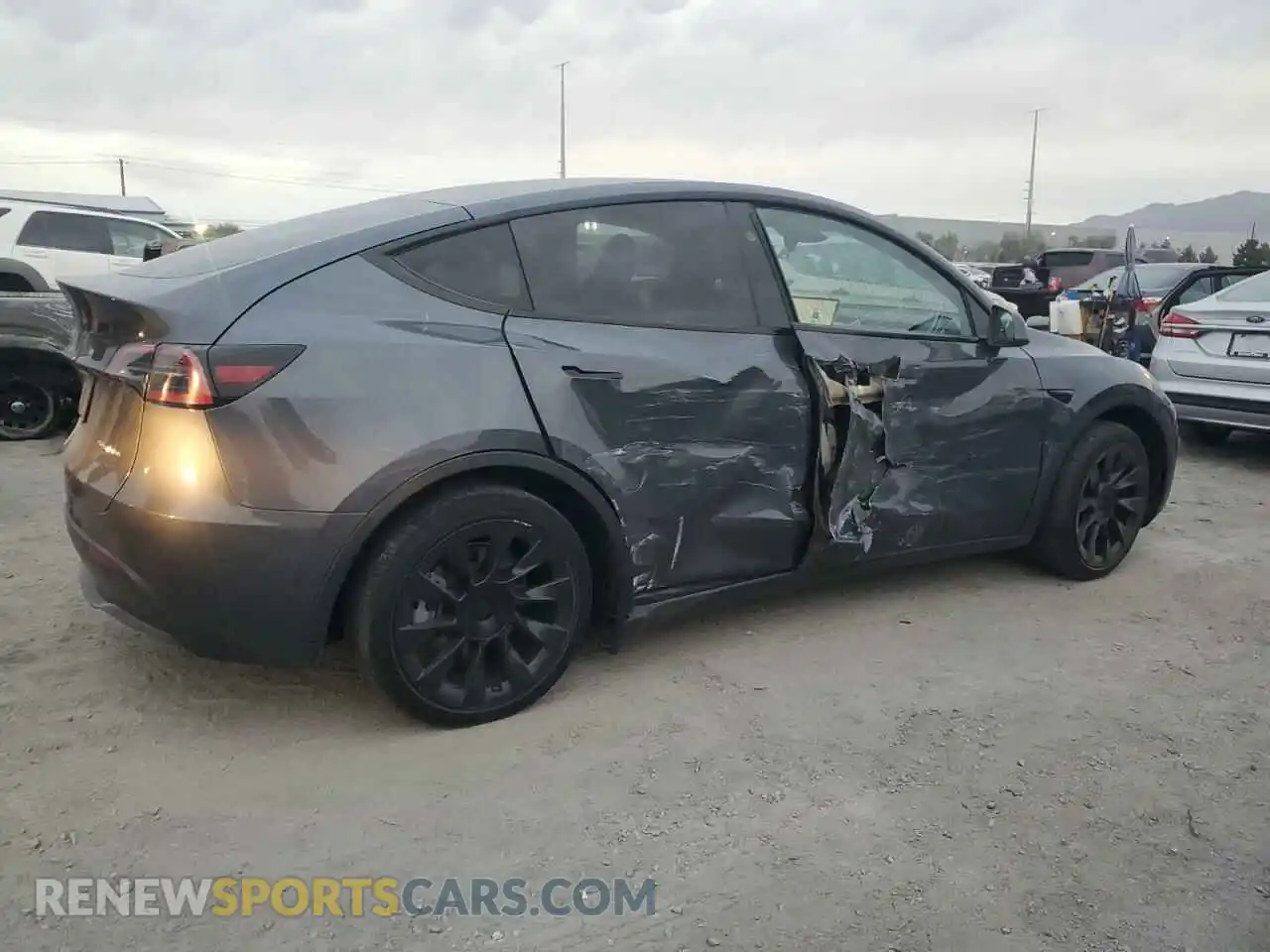 3 Photograph of a damaged car 7SAYGAEE1PF890855 TESLA MODEL Y 2023