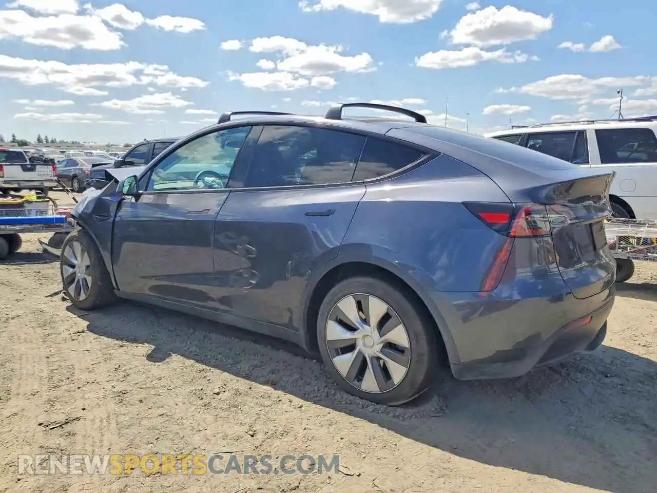 2 fotografías del automóvil dañado 7SAYGAEE2PF865561 TESLA MODEL Y 2023