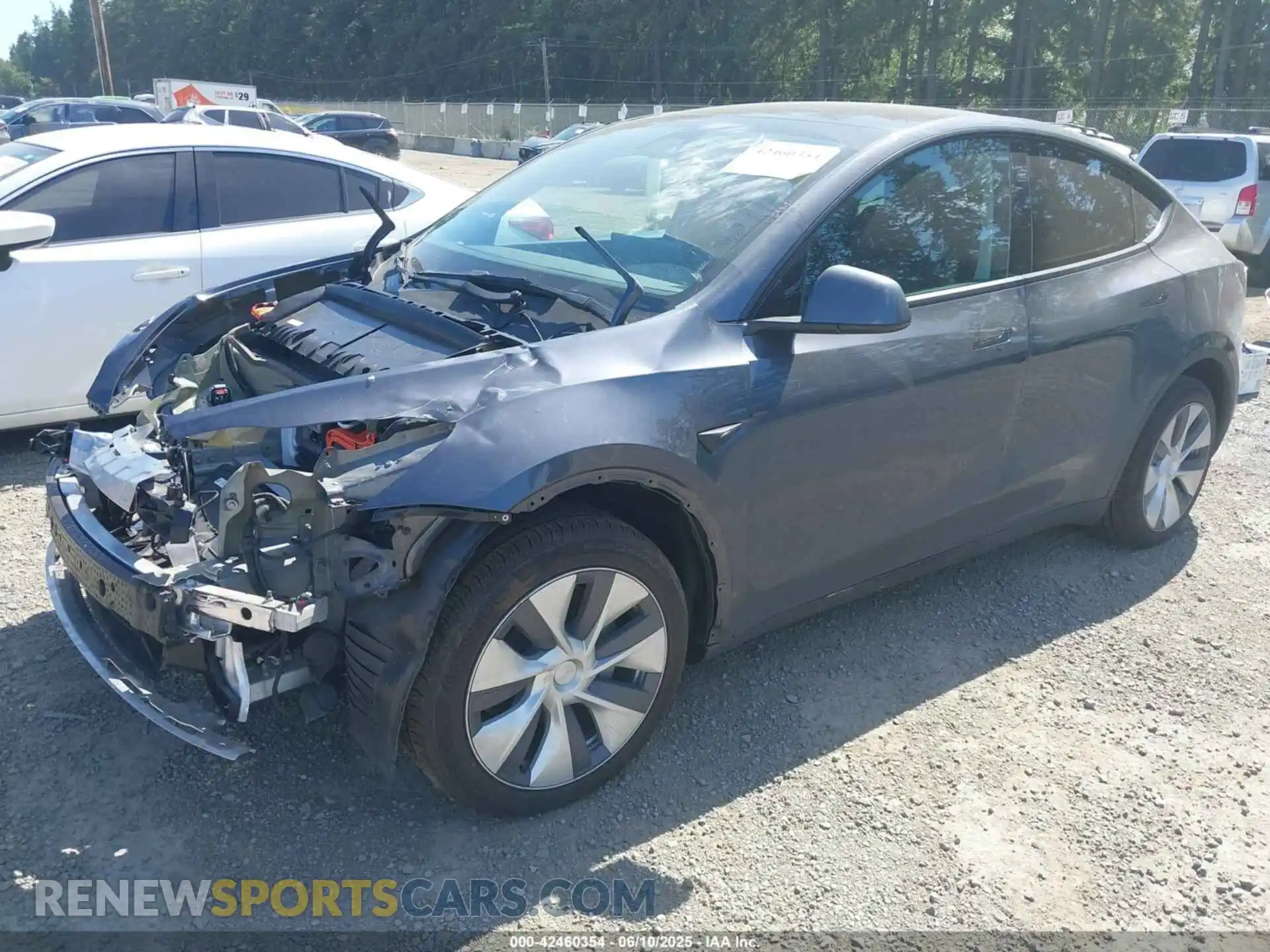 2 fotografías del automóvil dañado 7SAYGAEE2PF910479 TESLA MODEL Y 2023