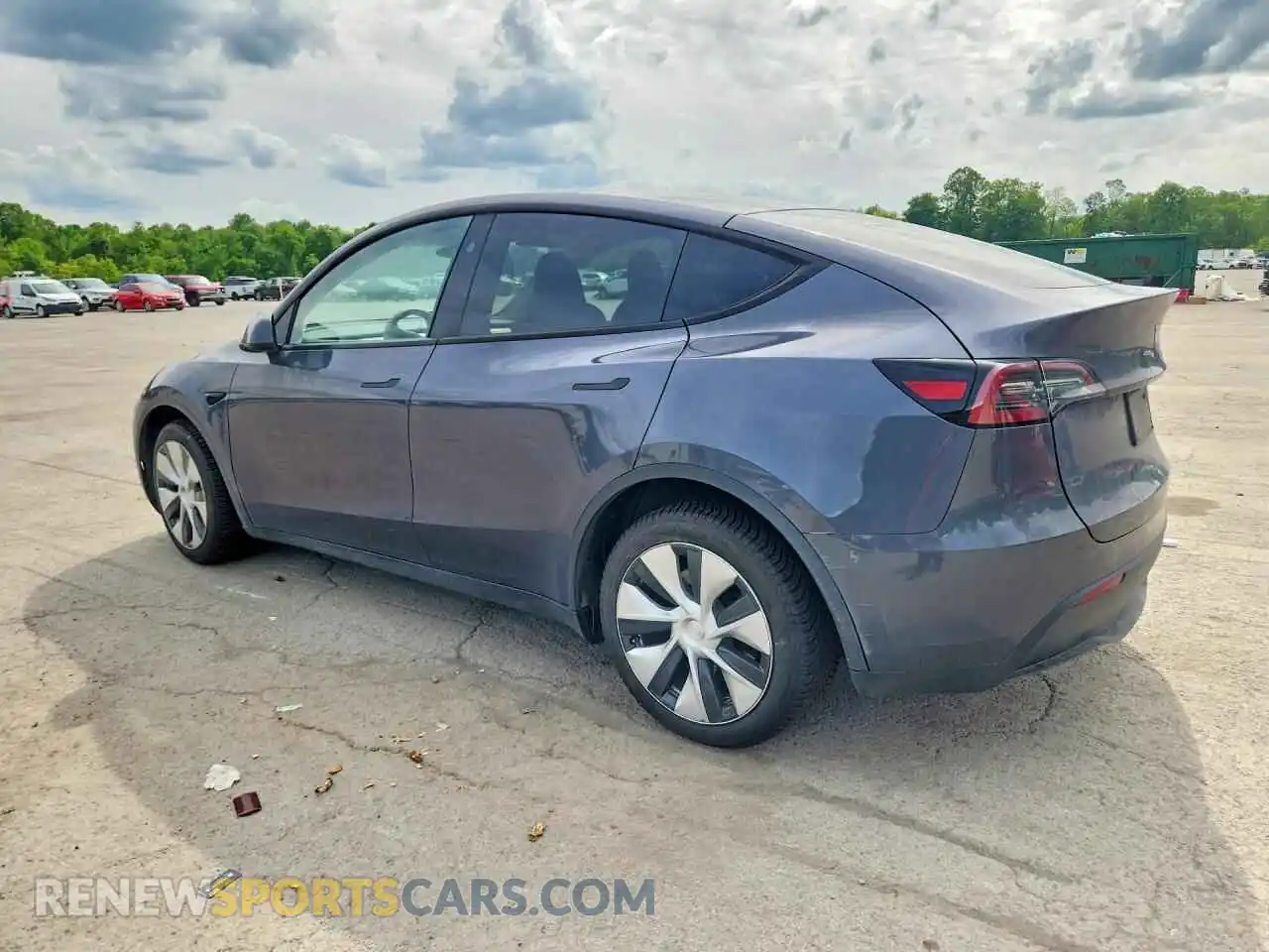 2 fotografías del automóvil dañado 7SAYGAEE3PF878495 TESLA MODEL Y 2023