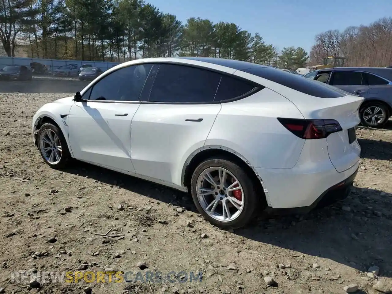 2 fotografías del automóvil dañado 7SAYGAEE4PF594793 TESLA MODEL Y 2023