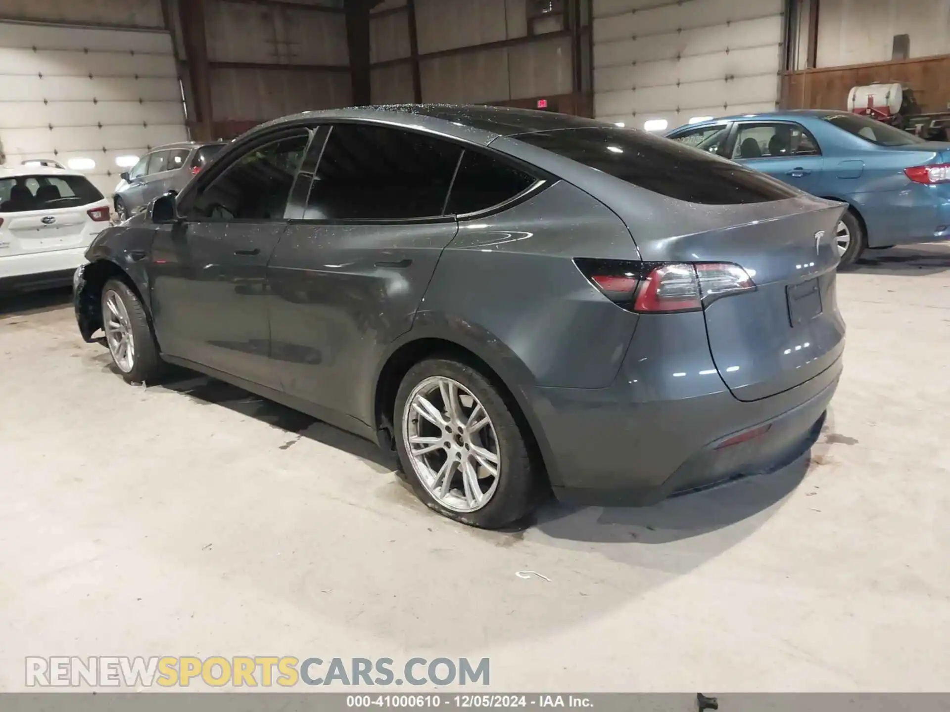 3 Photograph of a damaged car 7SAYGAEE5PF832344 TESLA MODEL Y 2023
