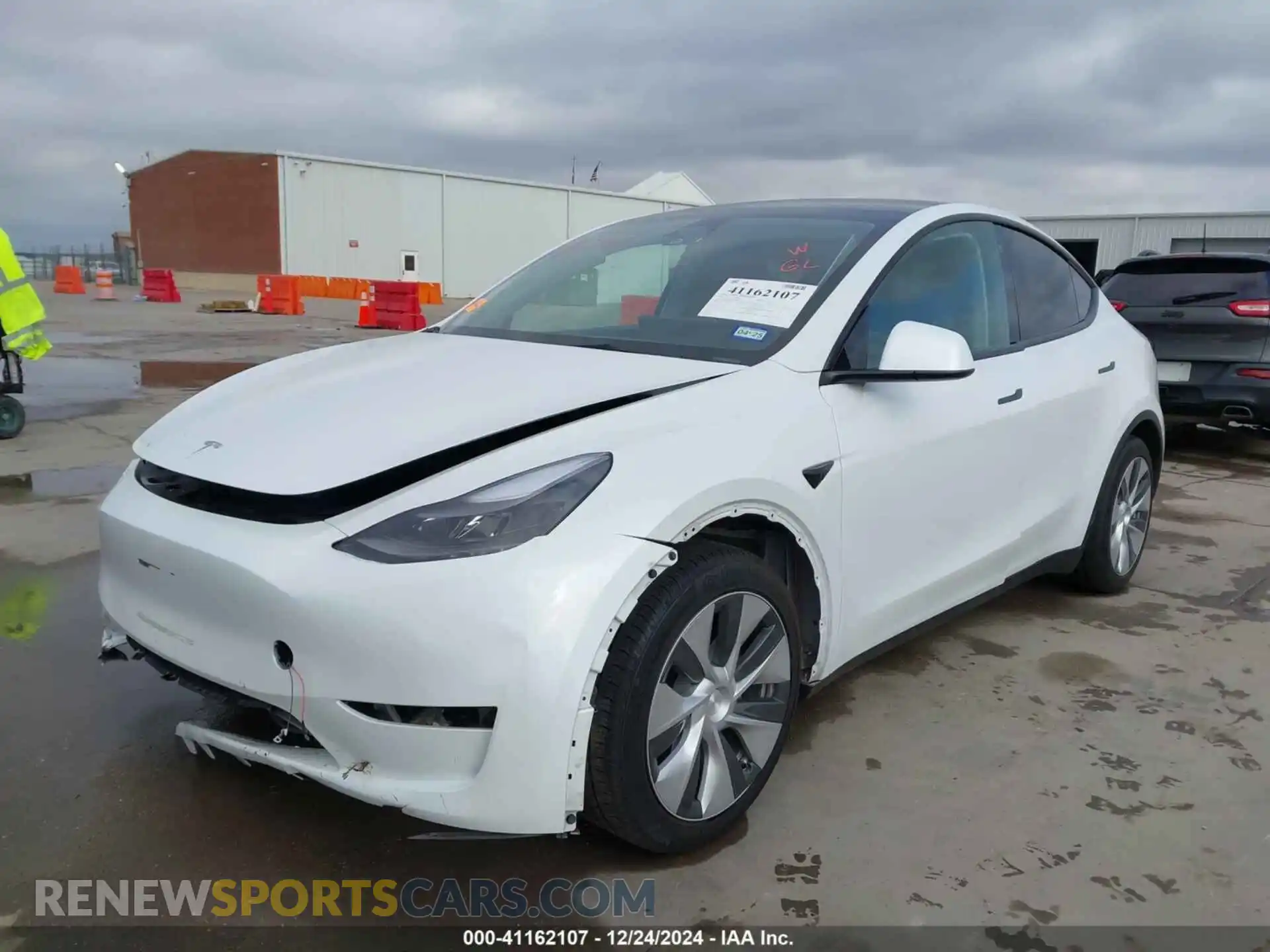 2 fotografías del automóvil dañado 7SAYGAEE6PF768444 TESLA MODEL Y 2023