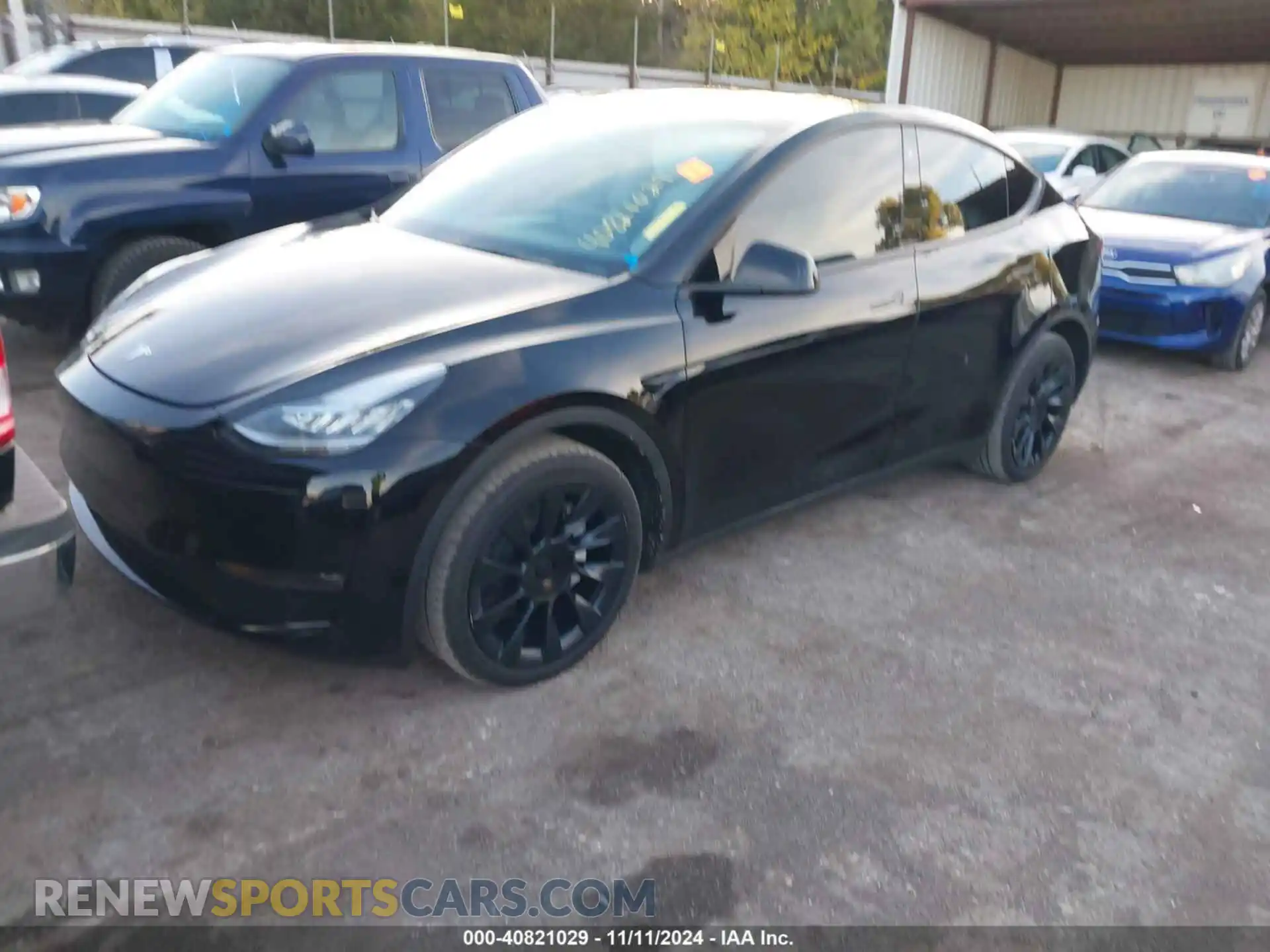 2 Photograph of a damaged car 7SAYGAEE7PF599180 TESLA MODEL Y 2023