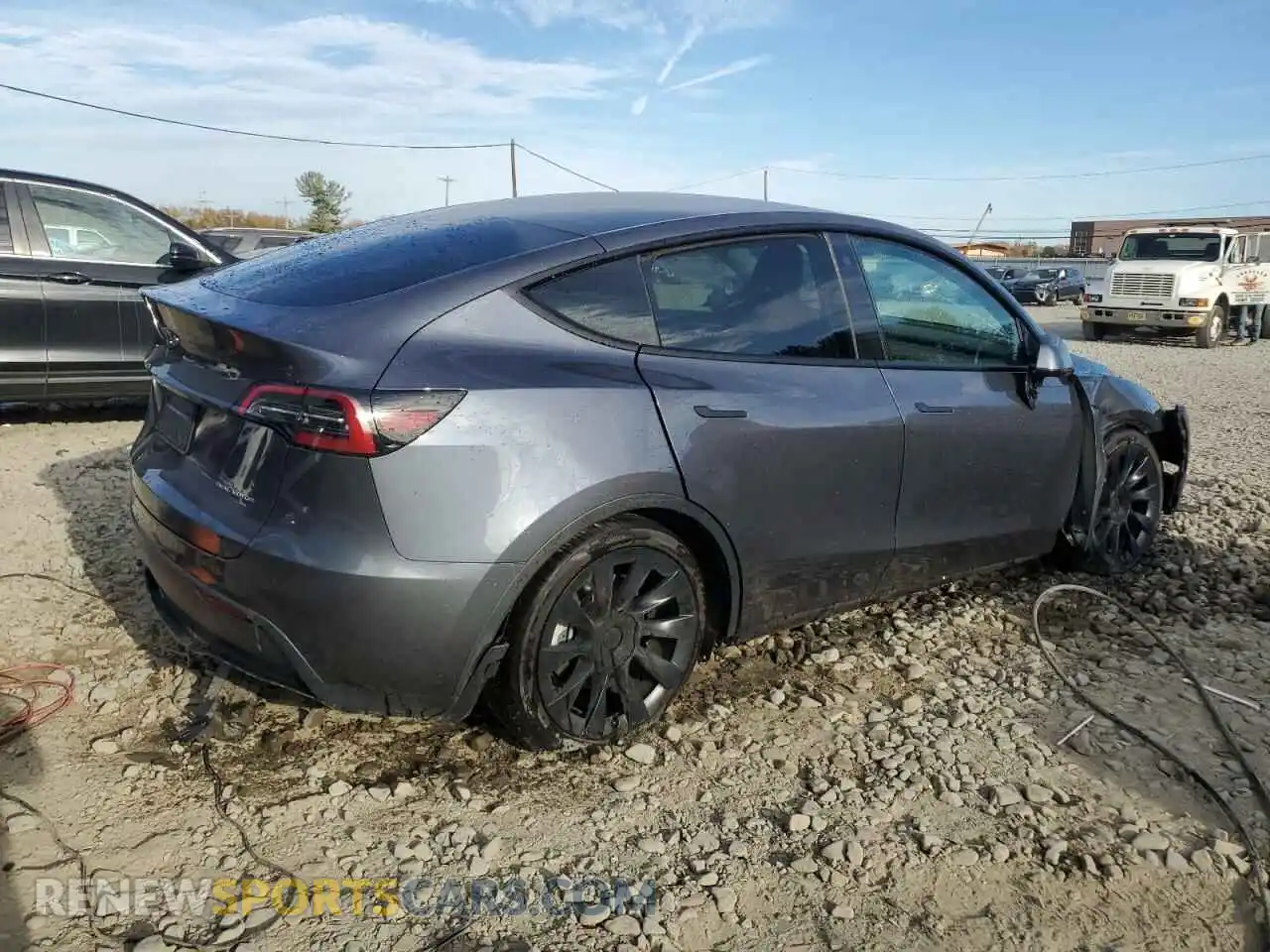3 Photograph of a damaged car 7SAYGAEE7PF692779 TESLA MODEL Y 2023