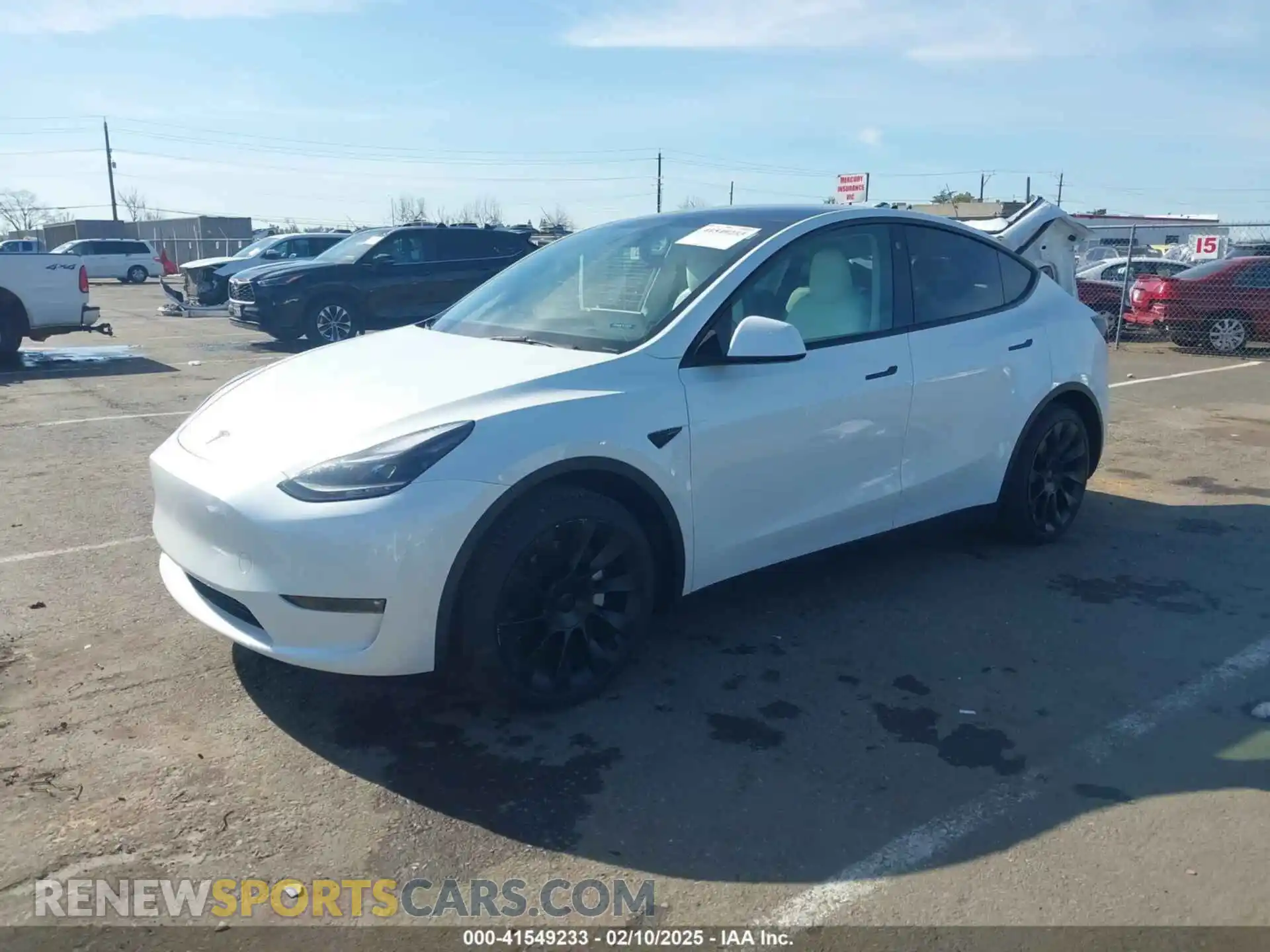2 fotografías del automóvil dañado 7SAYGAEE7PF741155 TESLA MODEL Y 2023