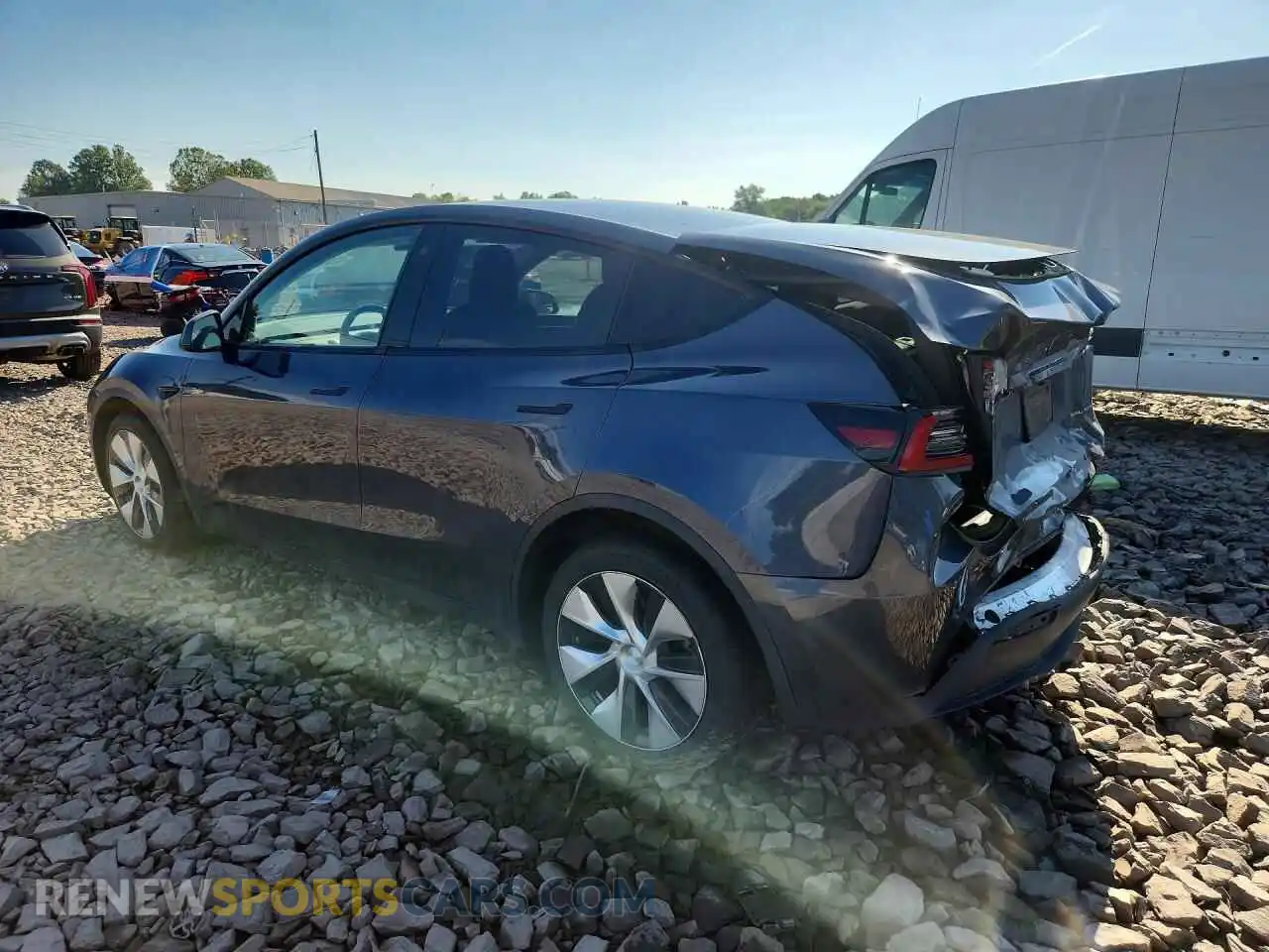 2 fotografías del automóvil dañado 7SAYGAEE8PF674114 TESLA MODEL Y 2023