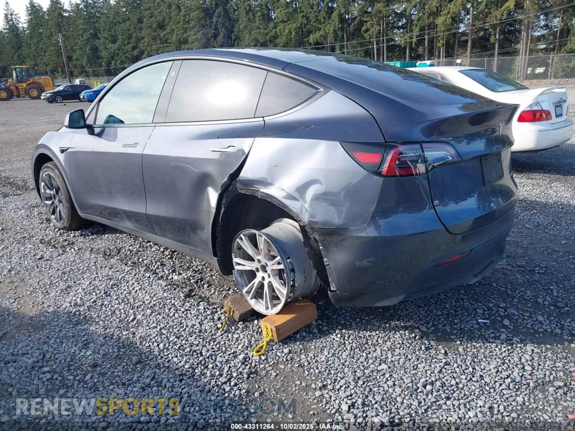 3 Photograph of a damaged car 7SAYGAEE8PF699949 TESLA MODEL Y 2023