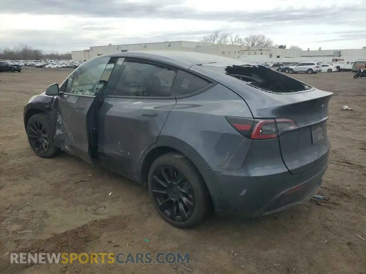 2 fotografías del automóvil dañado 7SAYGAEE8PF961940 TESLA MODEL Y 2023
