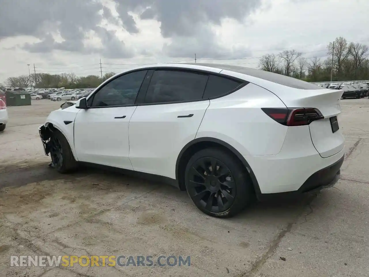 2 fotografías del automóvil dañado 7SAYGAEE9PF686434 TESLA MODEL Y 2023
