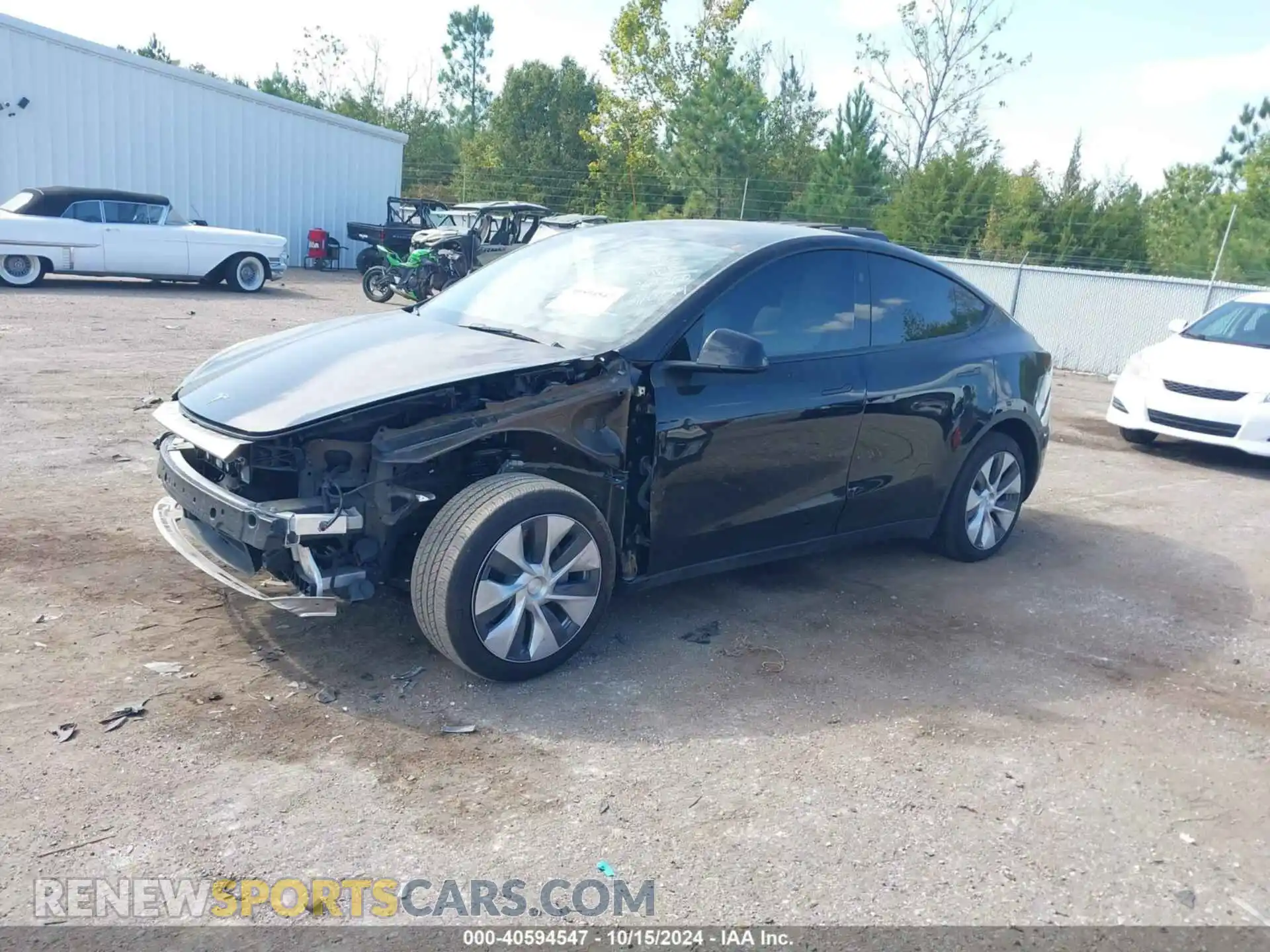 2 Photograph of a damaged car 7SAYGDED0PF964260 TESLA MODEL Y 2023