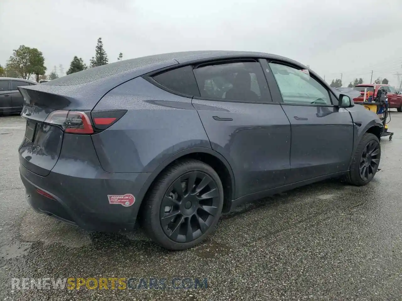 3 Photograph of a damaged car 7SAYGDED0PF977817 TESLA MODEL Y 2023