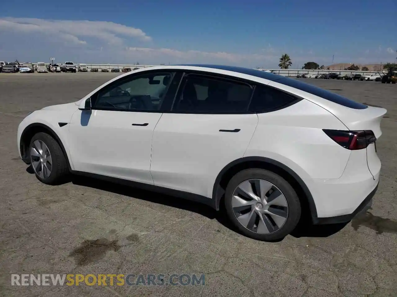 2 fotografías del automóvil dañado 7SAYGDED3PF966343 TESLA MODEL Y 2023
