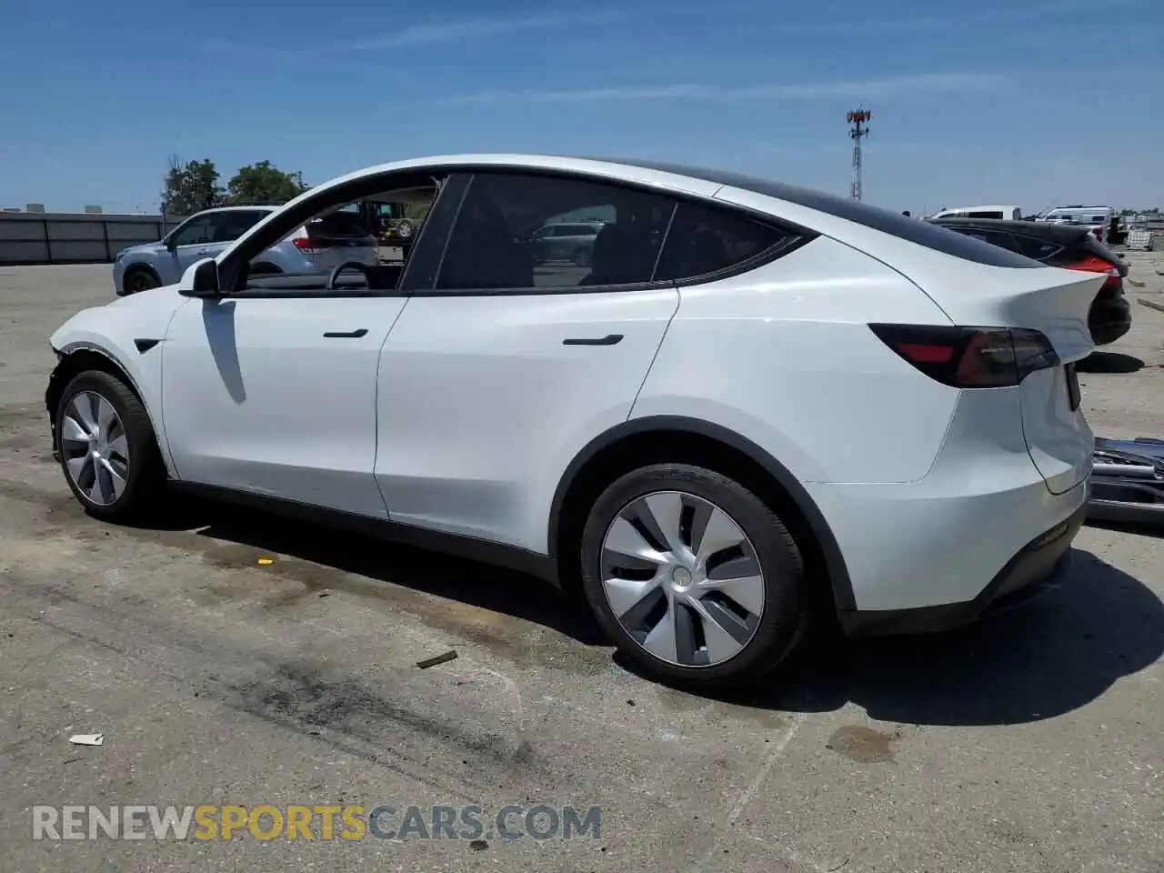 2 fotografías del automóvil dañado 7SAYGDED4PF934193 TESLA MODEL Y 2023