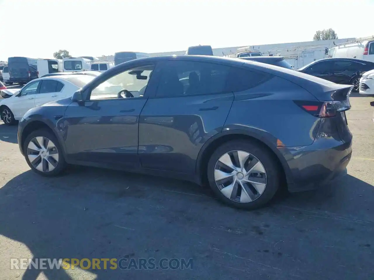 2 fotografías del automóvil dañado 7SAYGDED4PF940897 TESLA MODEL Y 2023