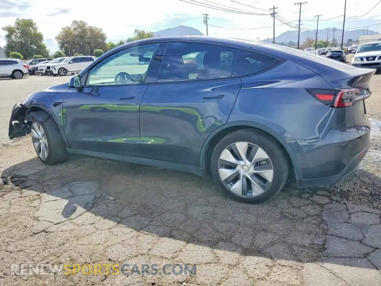 2 fotografías del automóvil dañado 7SAYGDED6PF960505 TESLA MODEL Y 2023