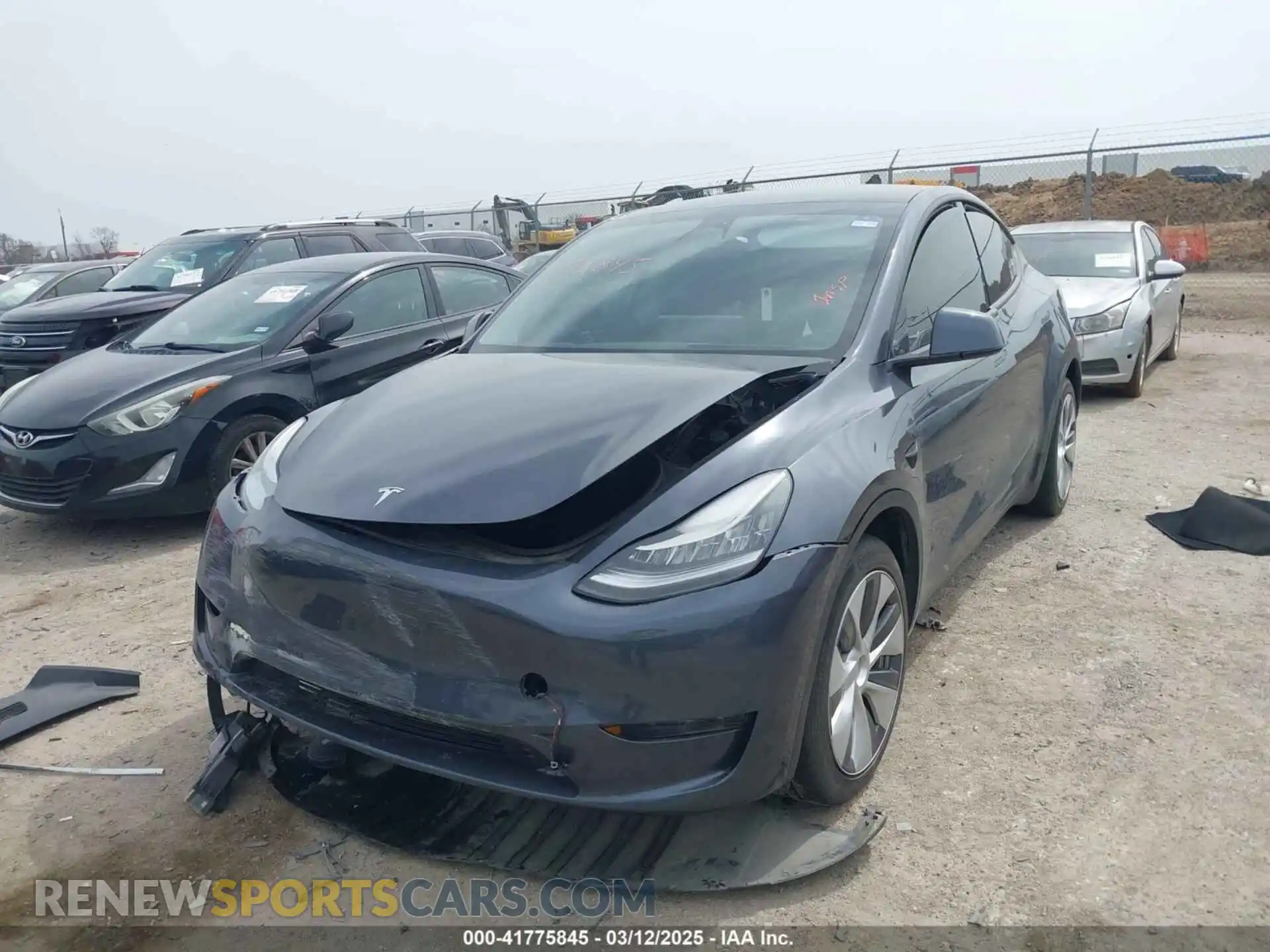2 fotografías del automóvil dañado 7SAYGDEE0PA036048 TESLA MODEL Y 2023