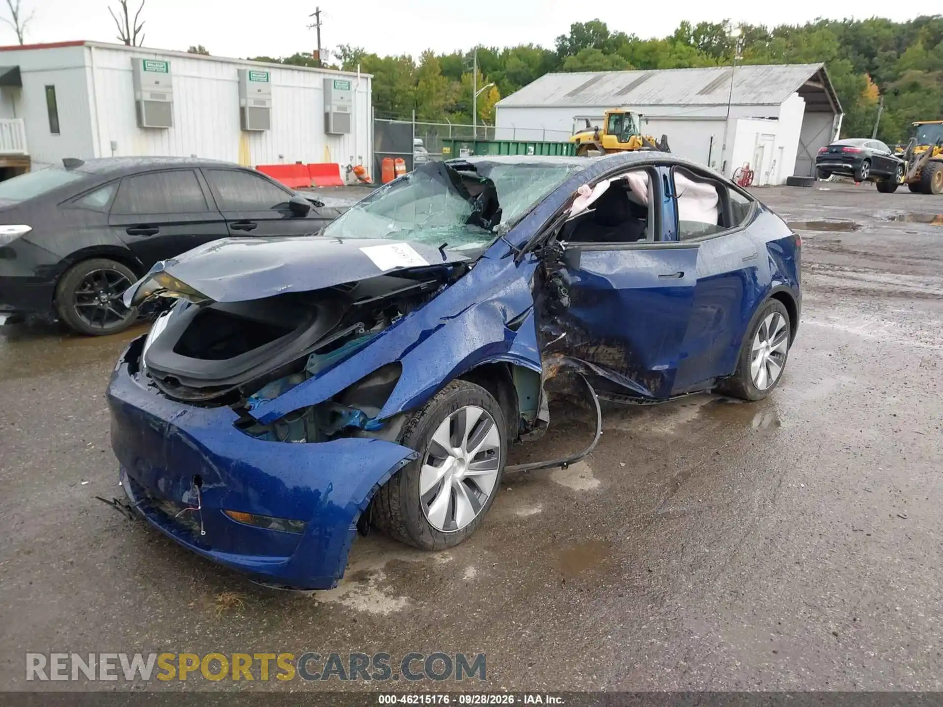 2 fotografías del automóvil dañado 7SAYGDEE0PA059040 TESLA MODEL Y 2023