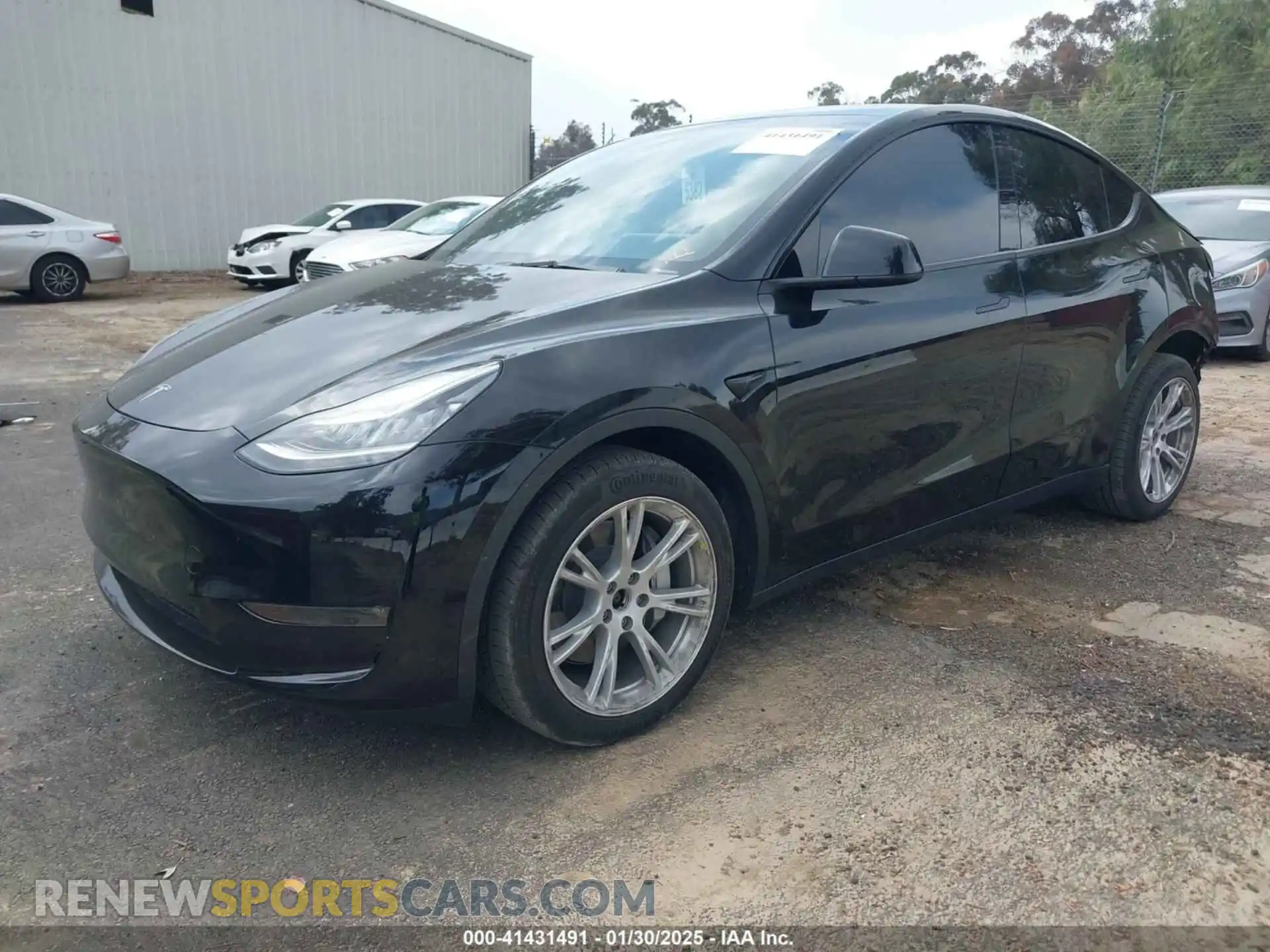 2 Photograph of a damaged car 7SAYGDEE0PA090000 TESLA MODEL Y 2023
