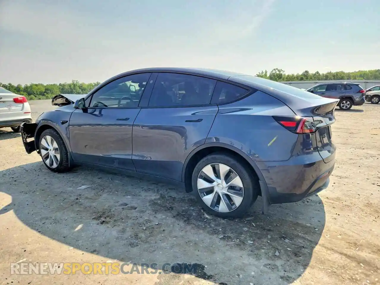 2 fotografías del automóvil dañado 7SAYGDEE0PA145531 TESLA MODEL Y 2023