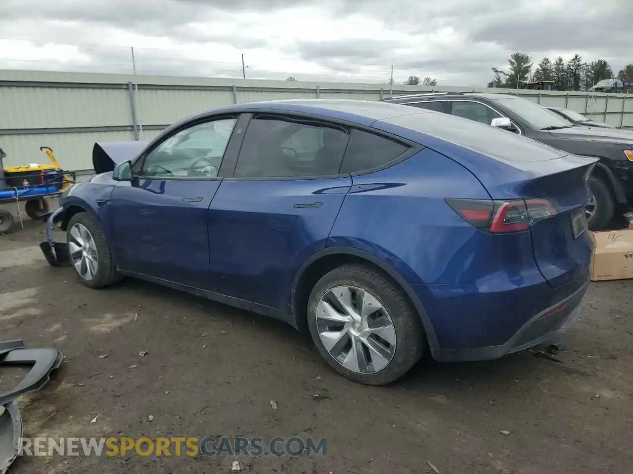 2 fotografías del automóvil dañado 7SAYGDEE0PA175032 TESLA MODEL Y 2023