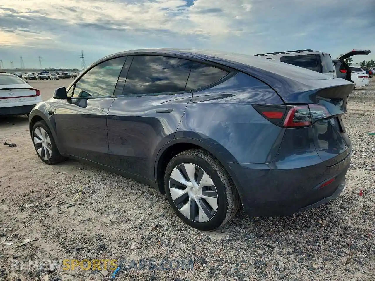 2 fotografías del automóvil dañado 7SAYGDEE0PA205789 TESLA MODEL Y 2023