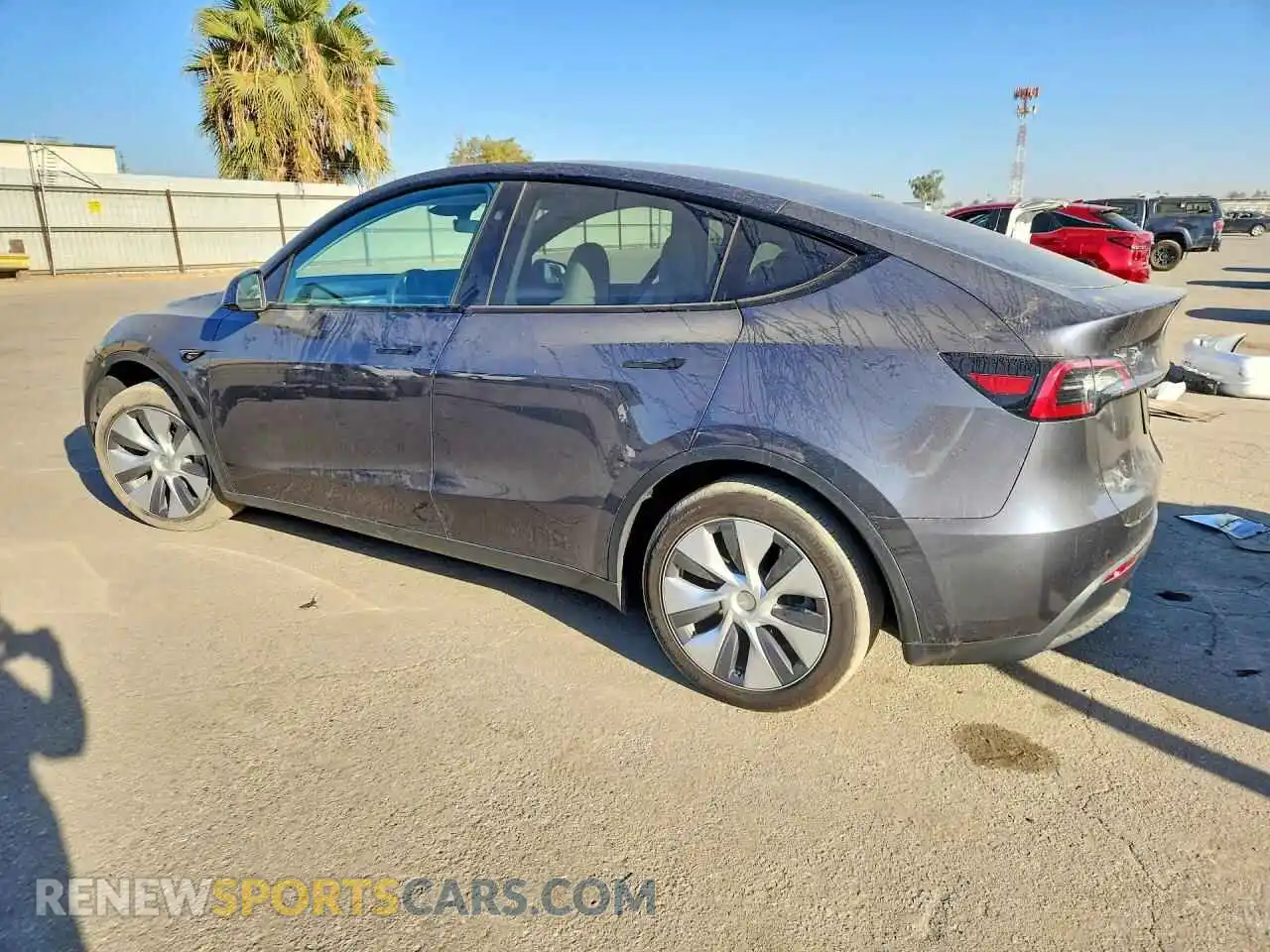 2 fotografías del automóvil dañado 7SAYGDEE0PF927251 TESLA MODEL Y 2023