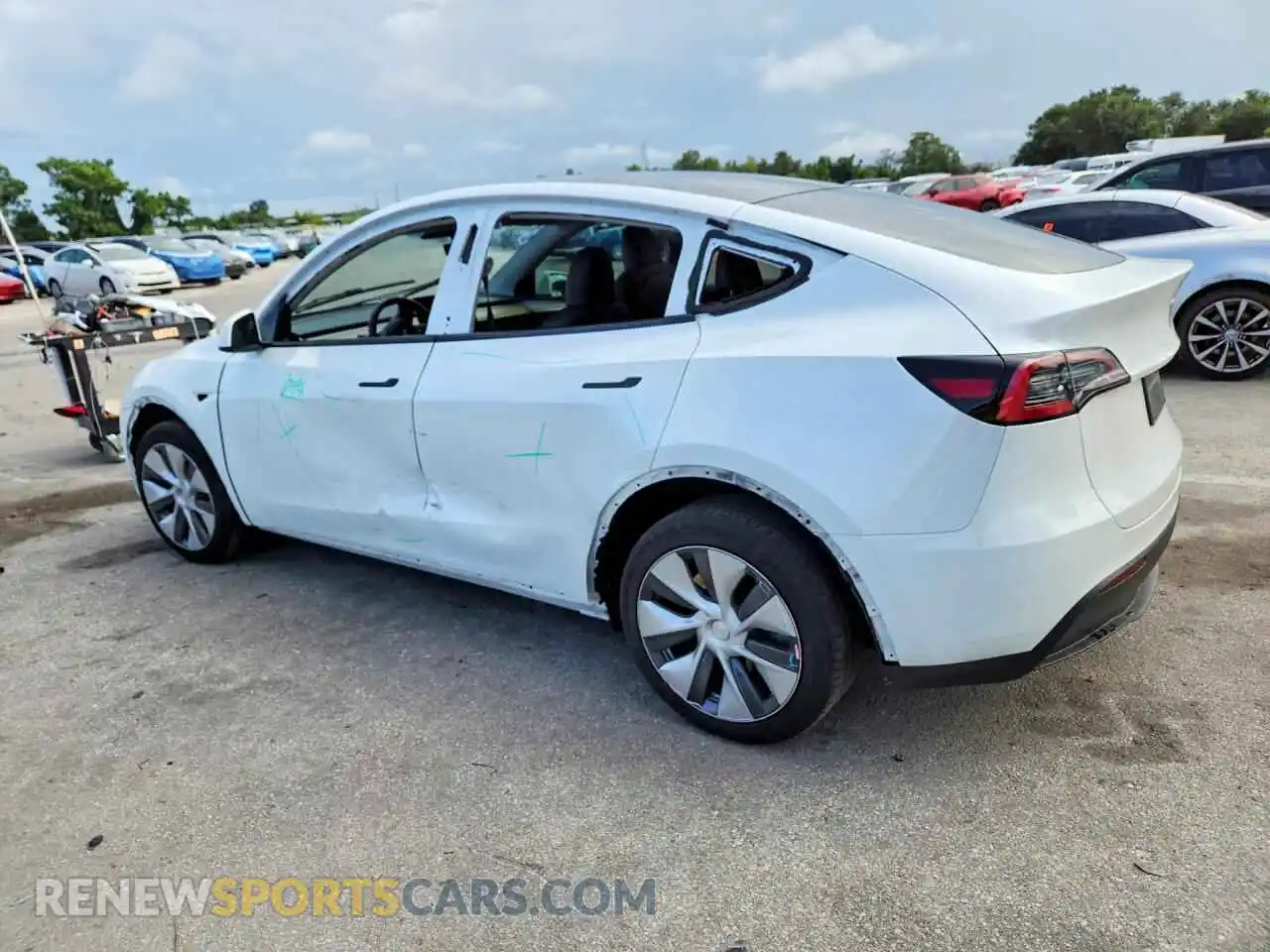 2 fotografías del automóvil dañado 7SAYGDEE1PA066868 TESLA MODEL Y 2023