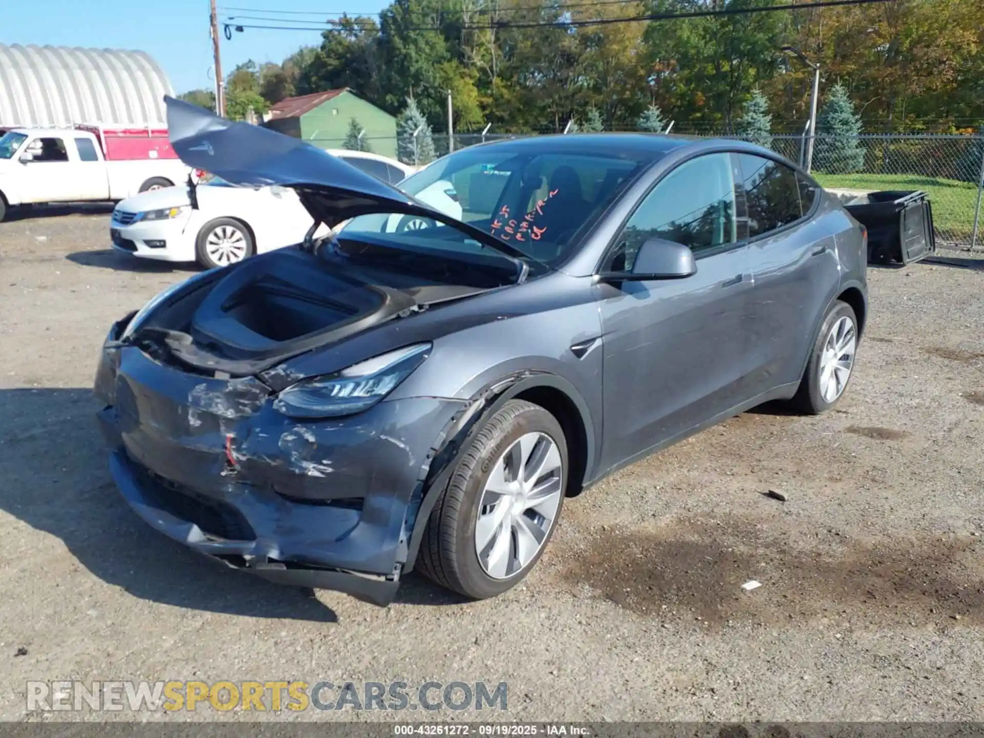 2 fotografías del automóvil dañado 7SAYGDEE1PA119472 TESLA MODEL Y 2023