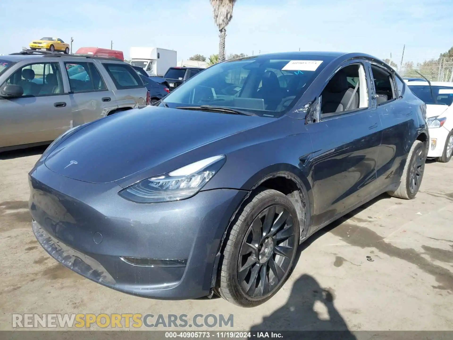 2 fotografías del automóvil dañado 7SAYGDEE1PA137017 TESLA MODEL Y 2023