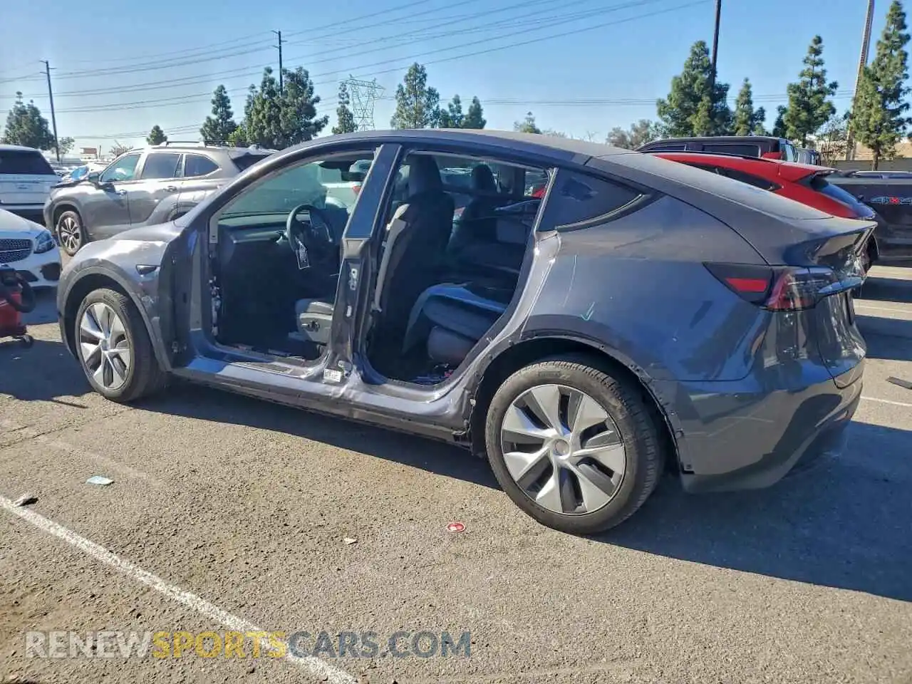 2 fotografías del automóvil dañado 7SAYGDEE1PA197377 TESLA MODEL Y 2023