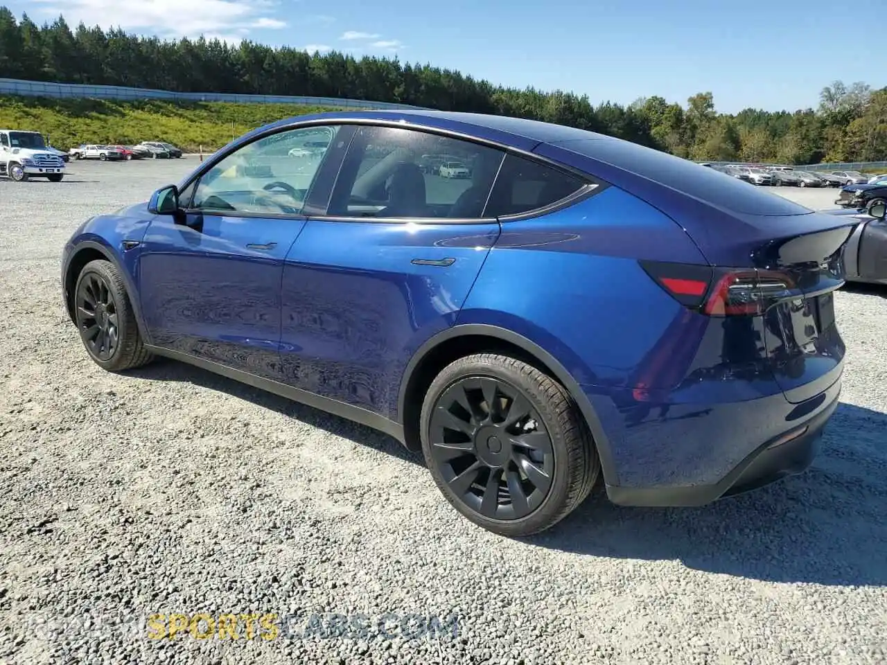2 fotografías del automóvil dañado 7SAYGDEE1PF758373 TESLA MODEL Y 2023