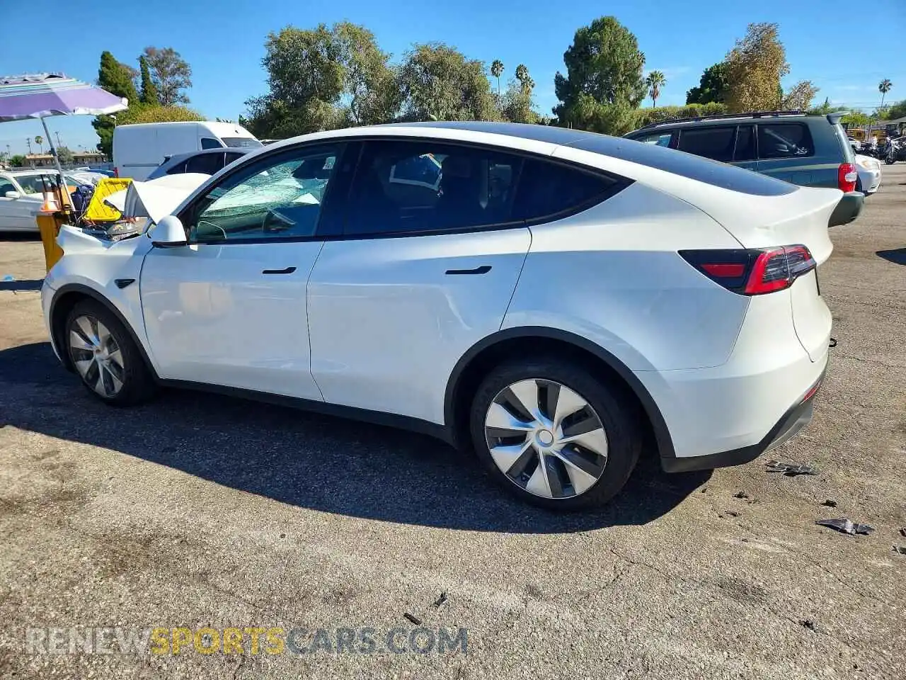 2 fotografías del automóvil dañado 7SAYGDEE1PF879453 TESLA MODEL Y 2023