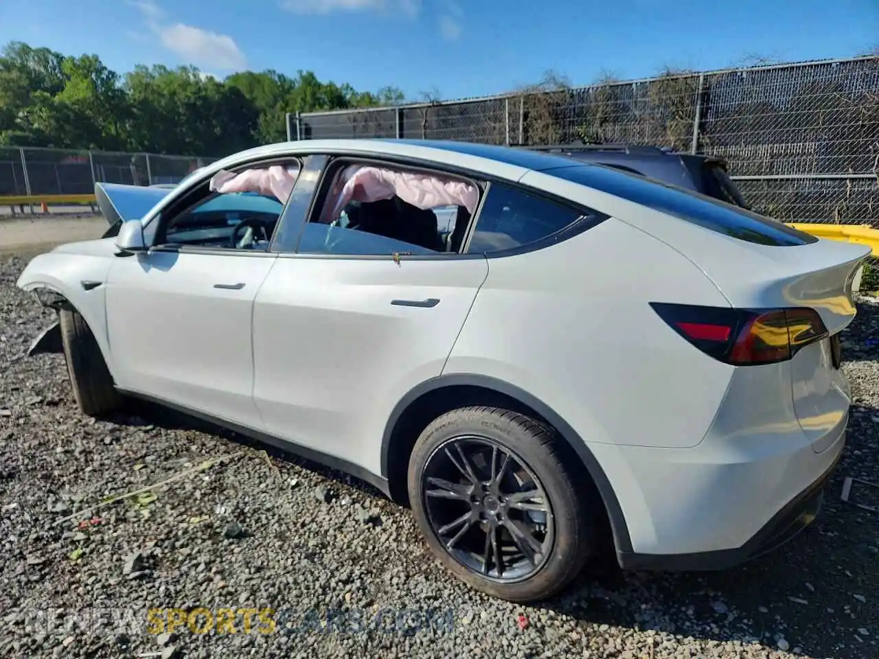 2 fotografías del automóvil dañado 7SAYGDEE2PA042109 TESLA MODEL Y 2023