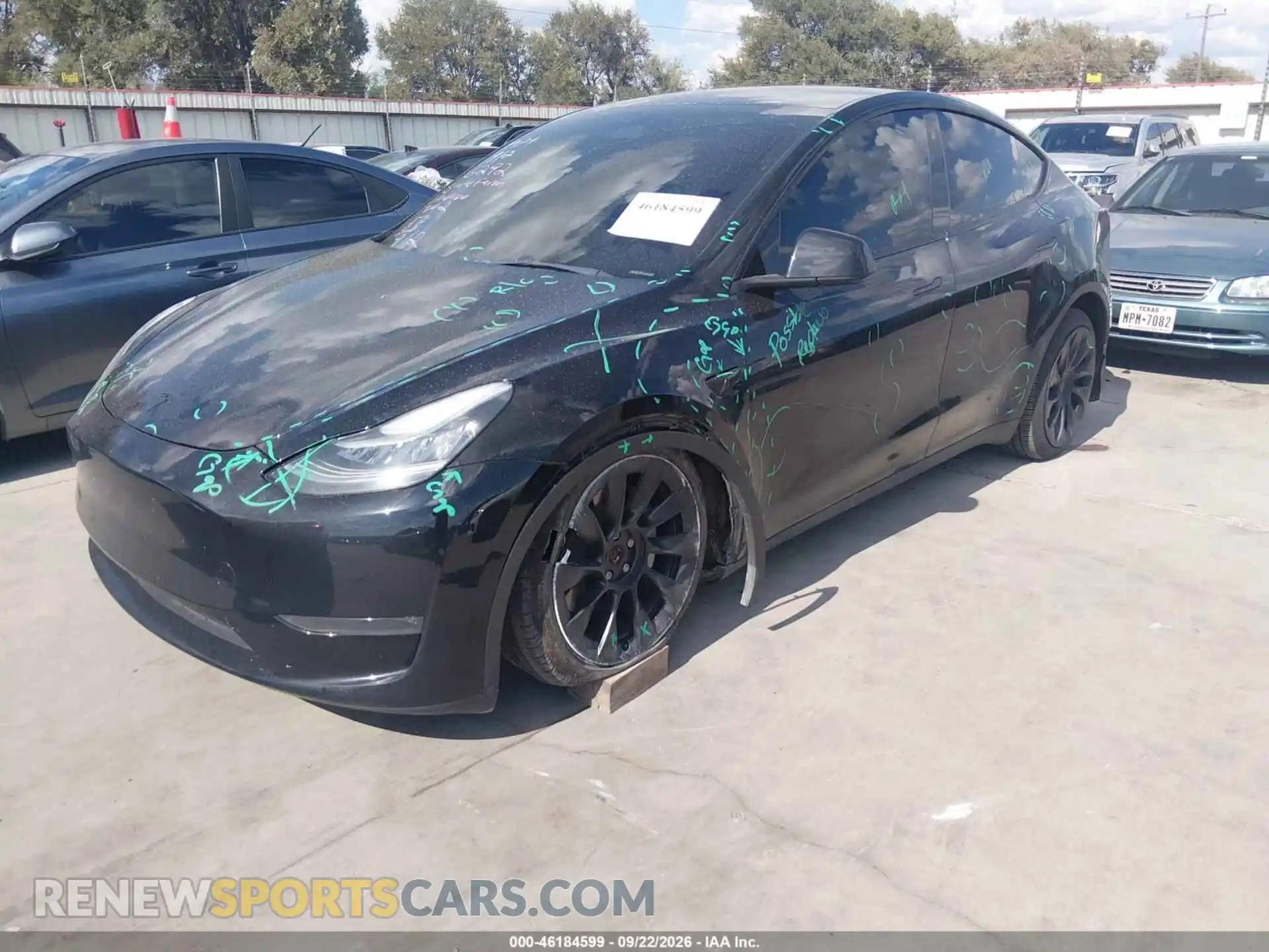 2 fotografías del automóvil dañado 7SAYGDEE2PA057905 TESLA MODEL Y 2023