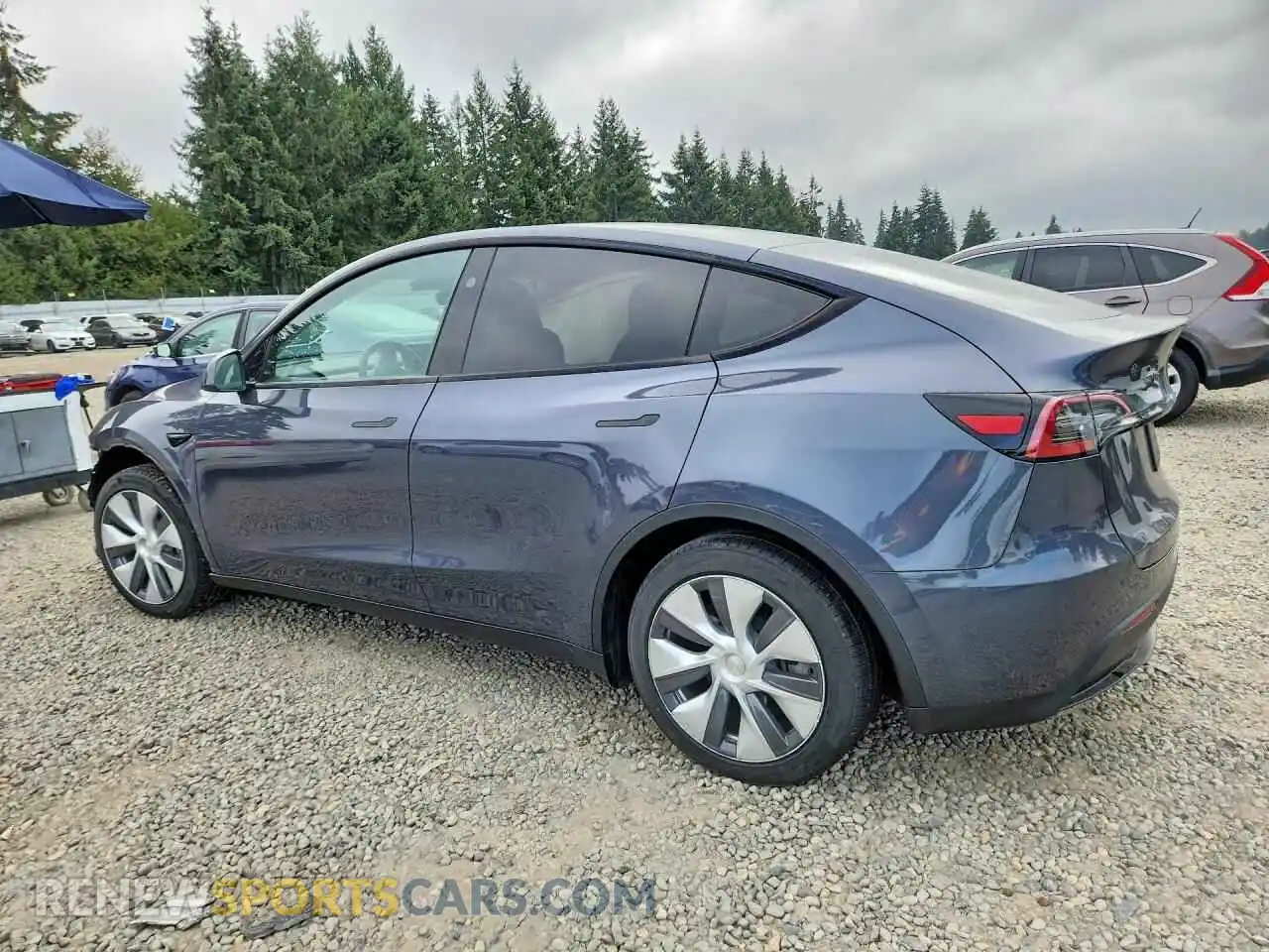 2 fotografías del automóvil dañado 7SAYGDEE2PA120856 TESLA MODEL Y 2023