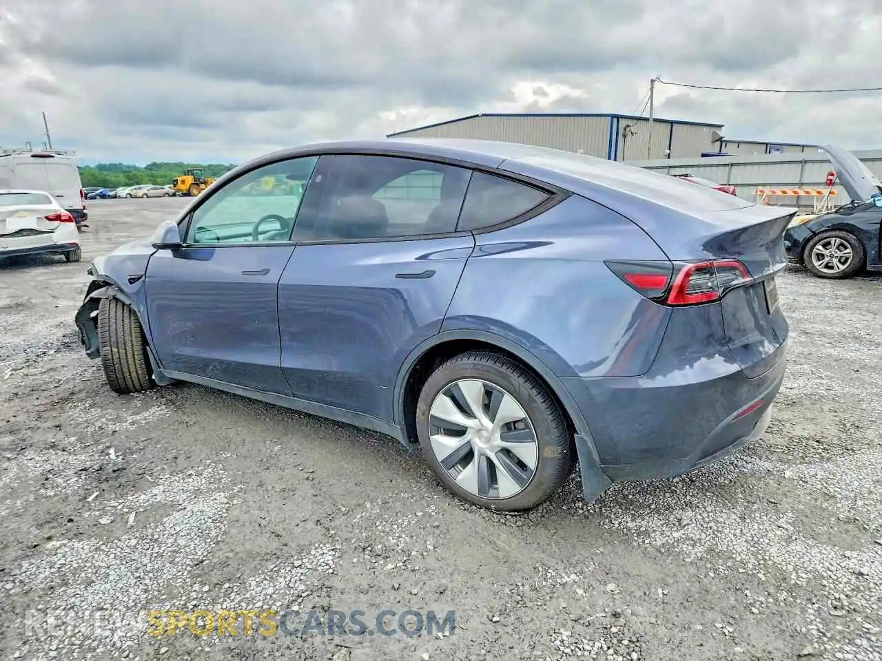 2 fotografías del automóvil dañado 7SAYGDEE2PA163786 TESLA MODEL Y 2023