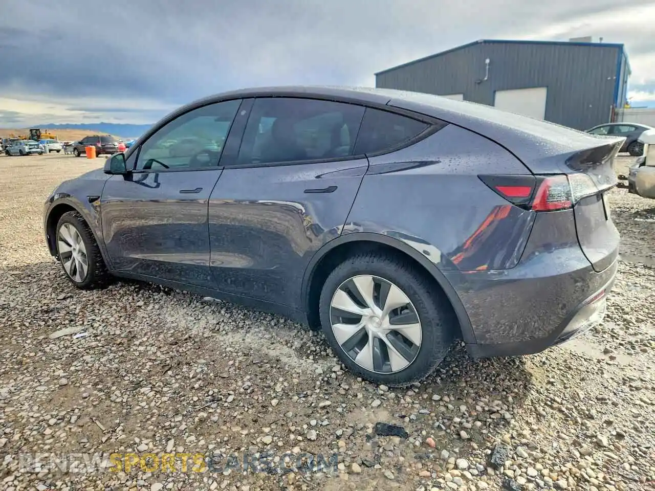 2 fotografías del automóvil dañado 7SAYGDEE2PF615416 TESLA MODEL Y 2023